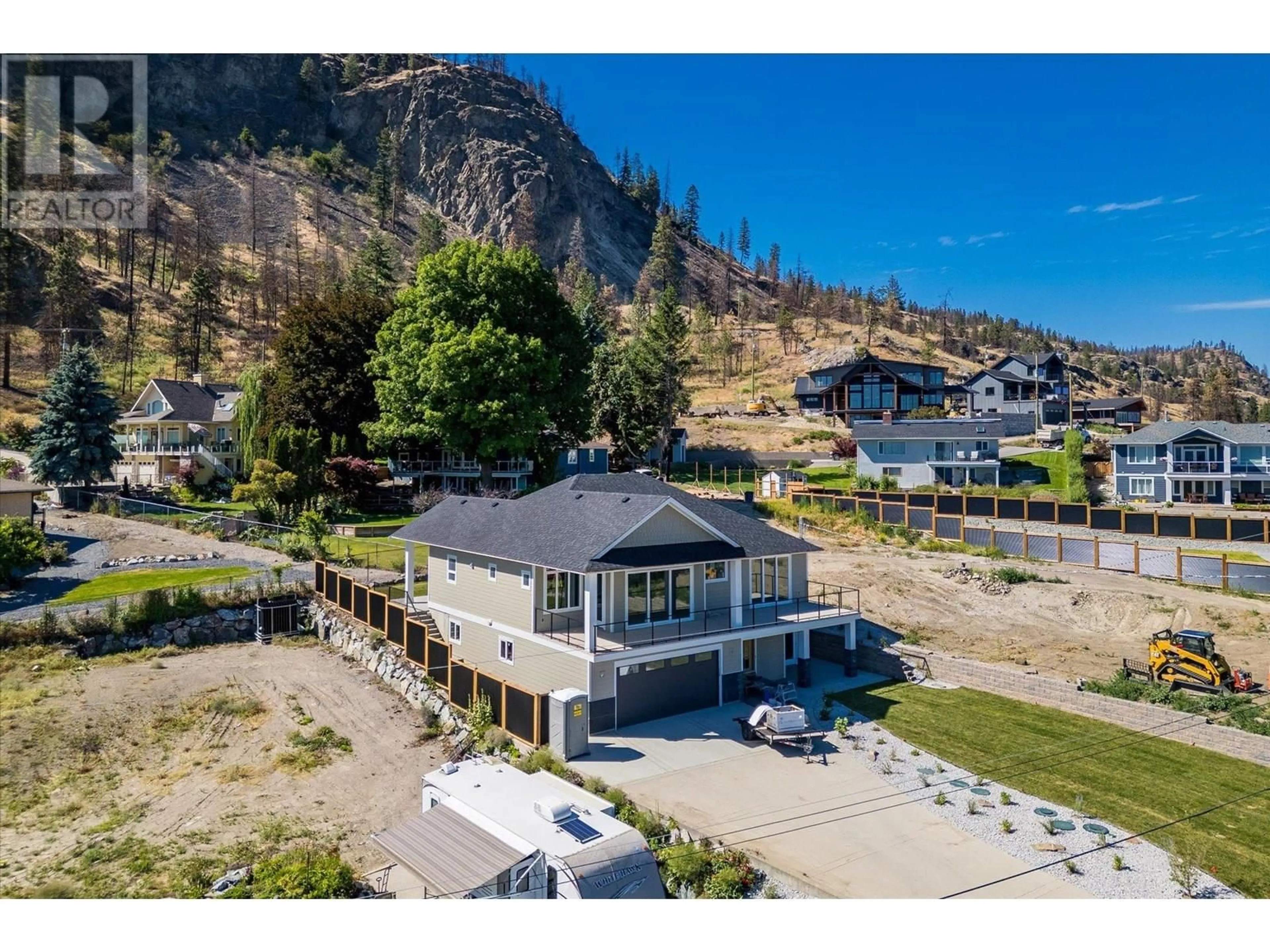 A pic from outside/outdoor area/front of a property/back of a property/a pic from drone, mountain view for 167 HELDON COURT, West Kelowna British Columbia V1Z3S5