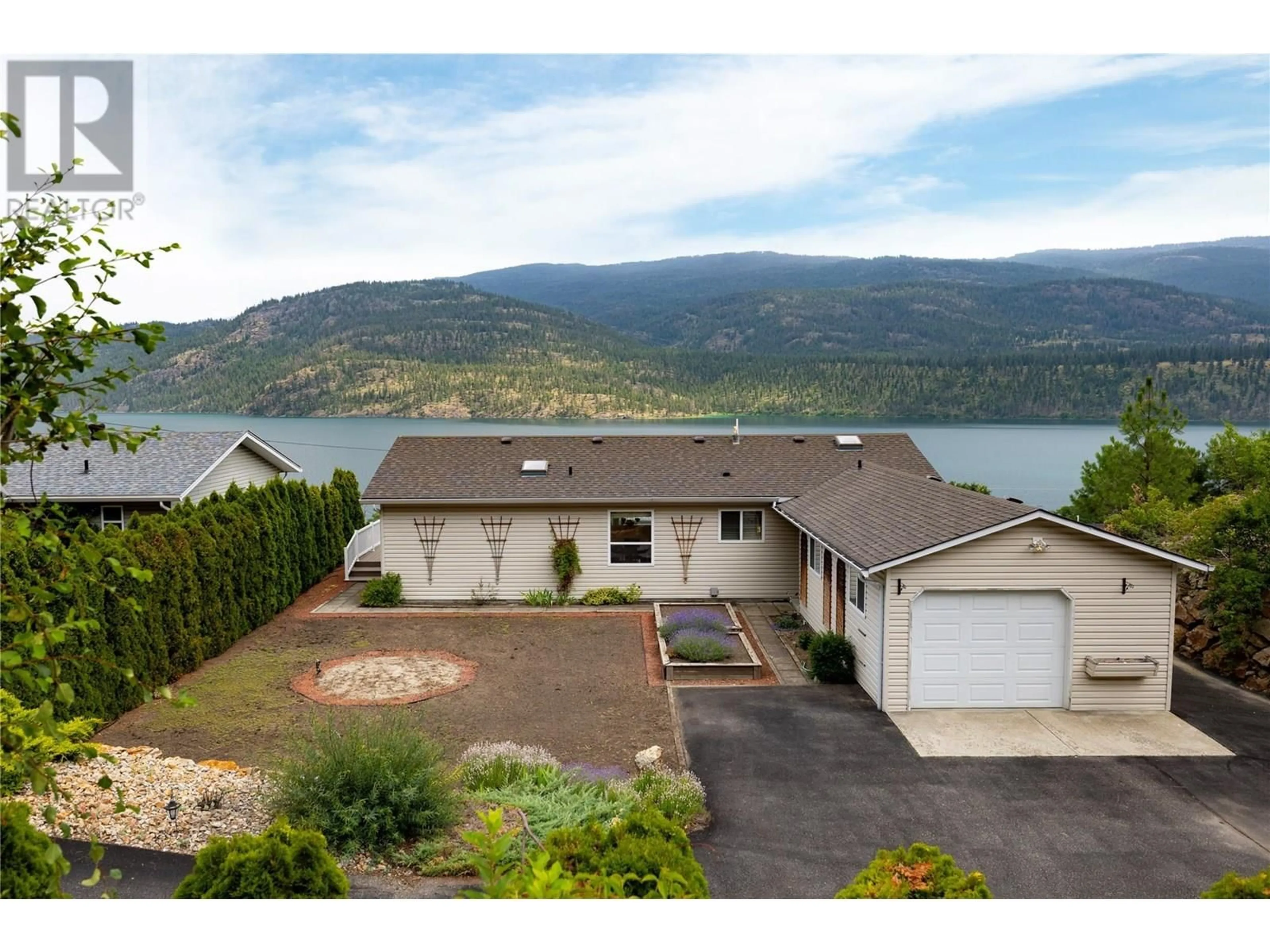 A pic from outside/outdoor area/front of a property/back of a property/a pic from drone, water/lake/river/ocean view for 17610  41 RAWSTHORNE ROAD, Lake Country British Columbia V4V2G1