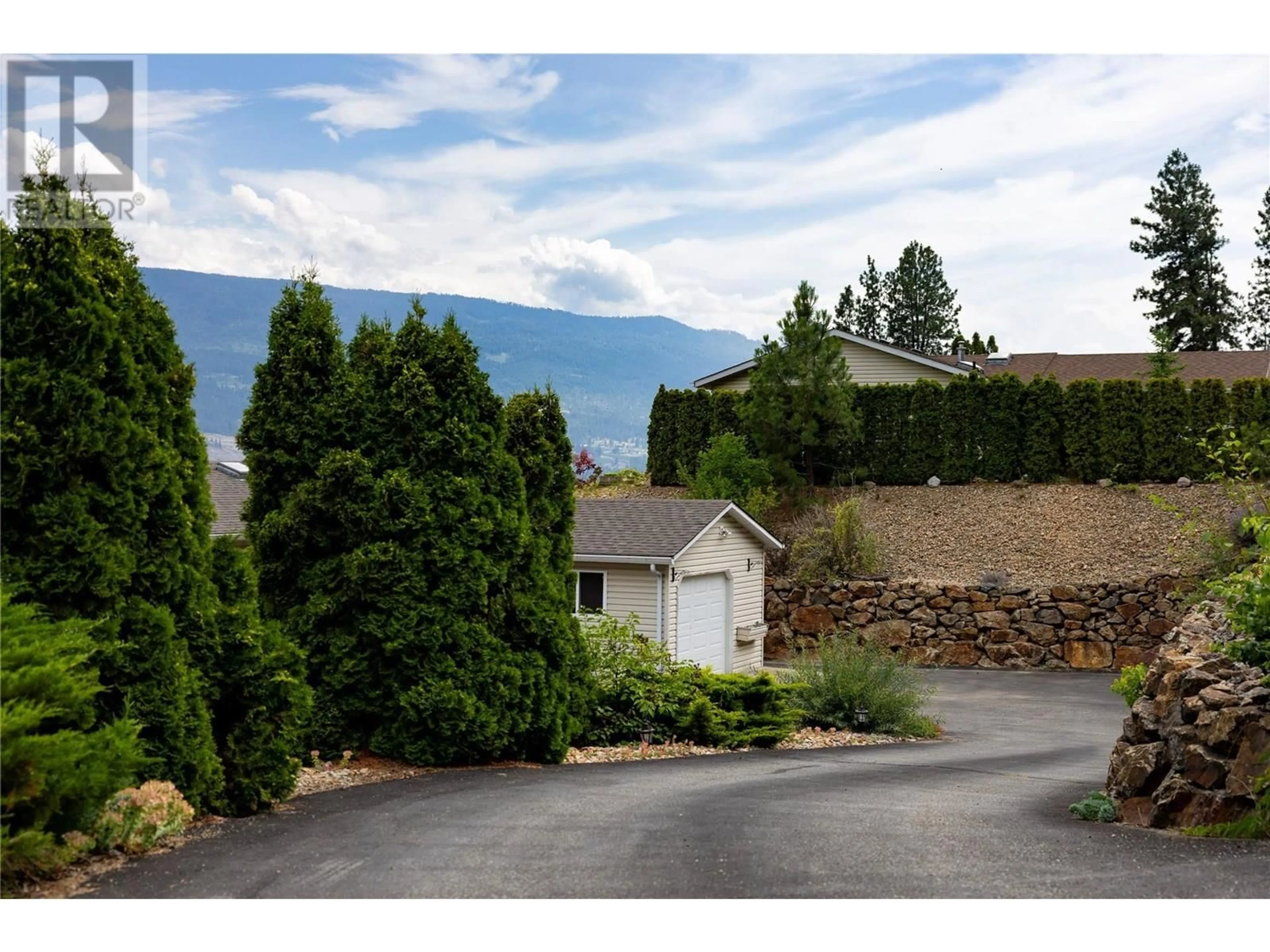 A pic from outside/outdoor area/front of a property/back of a property/a pic from drone, mountain view for 17610  41 RAWSTHORNE ROAD, Lake Country British Columbia V4V2G1