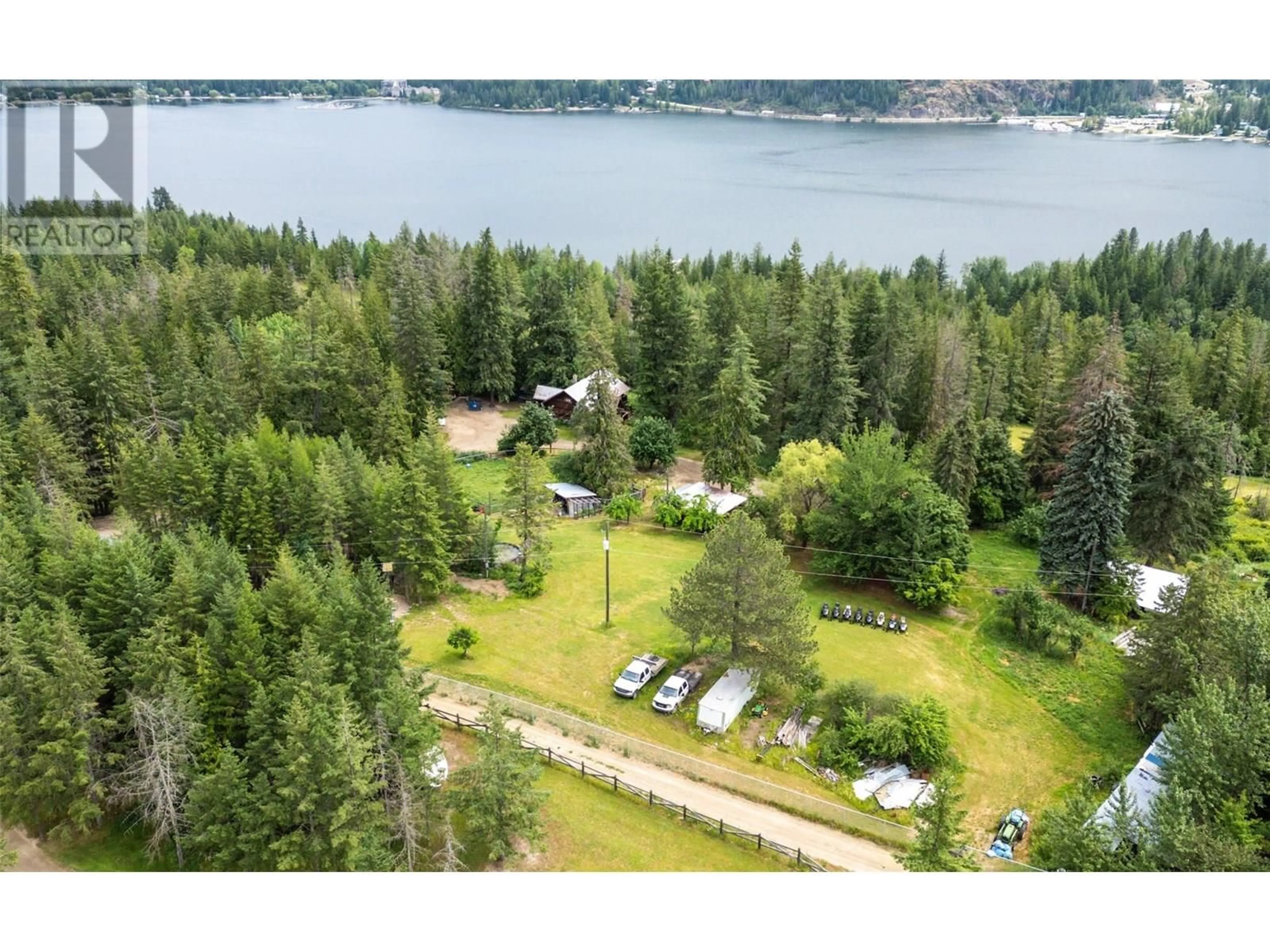 A pic from outside/outdoor area/front of a property/back of a property/a pic from drone, water/lake/river/ocean view for 9866 OLD SPALLUMCHEEN ROAD, Sicamous British Columbia V0E2V3