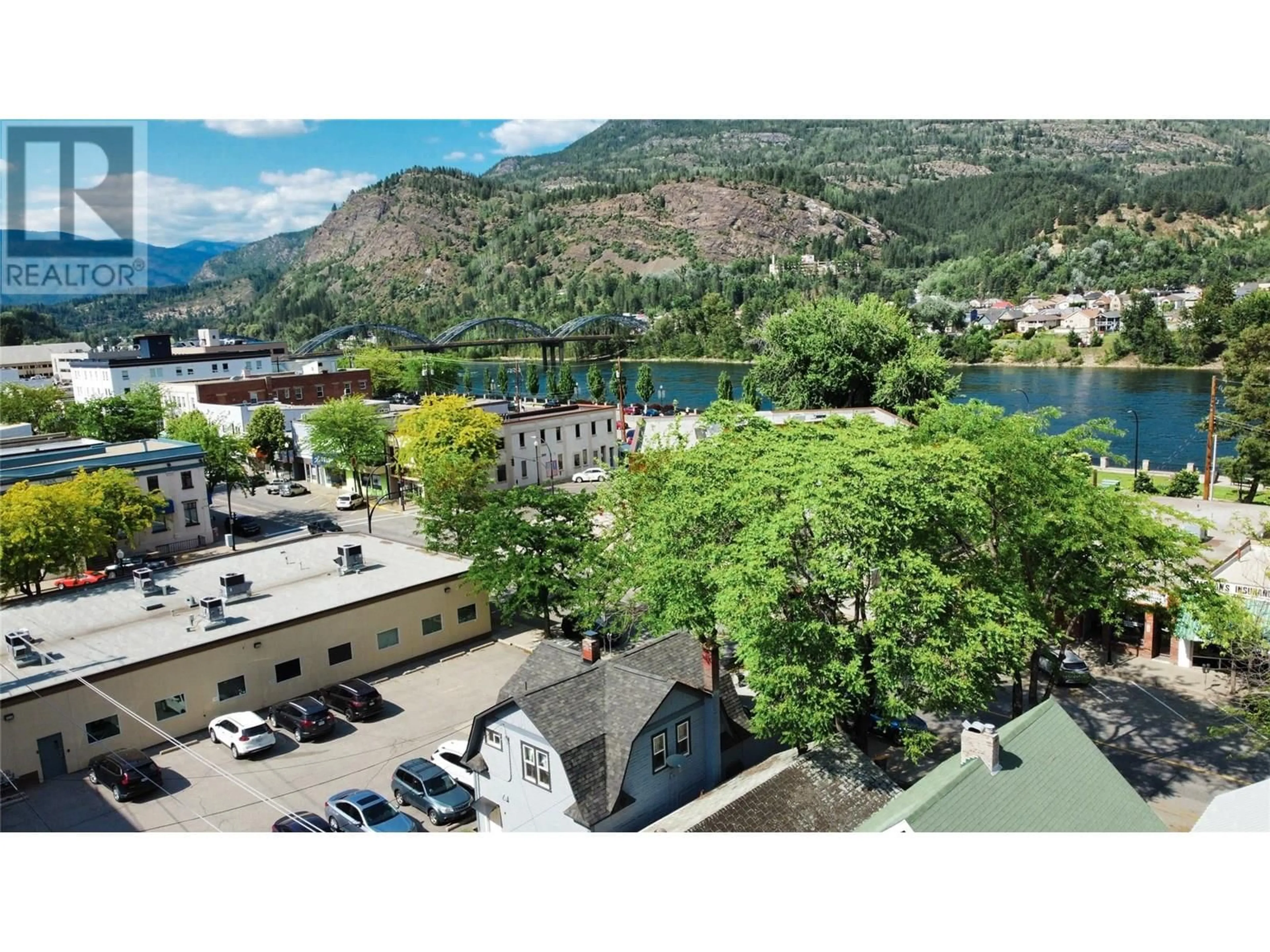 A pic from outside/outdoor area/front of a property/back of a property/a pic from drone, mountain view for 1560 BAY AVENUE, Trail British Columbia V1R4B3