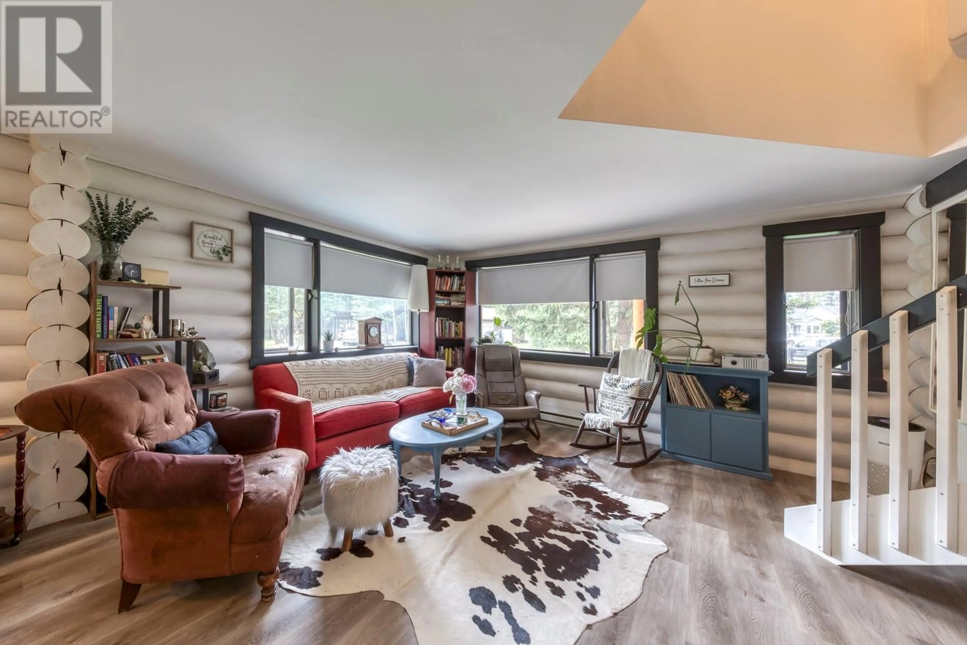 Living room with furniture, wood/laminate floor for 7500 RIVERCREST ROAD, Radium Hot Springs British Columbia V0A1M0