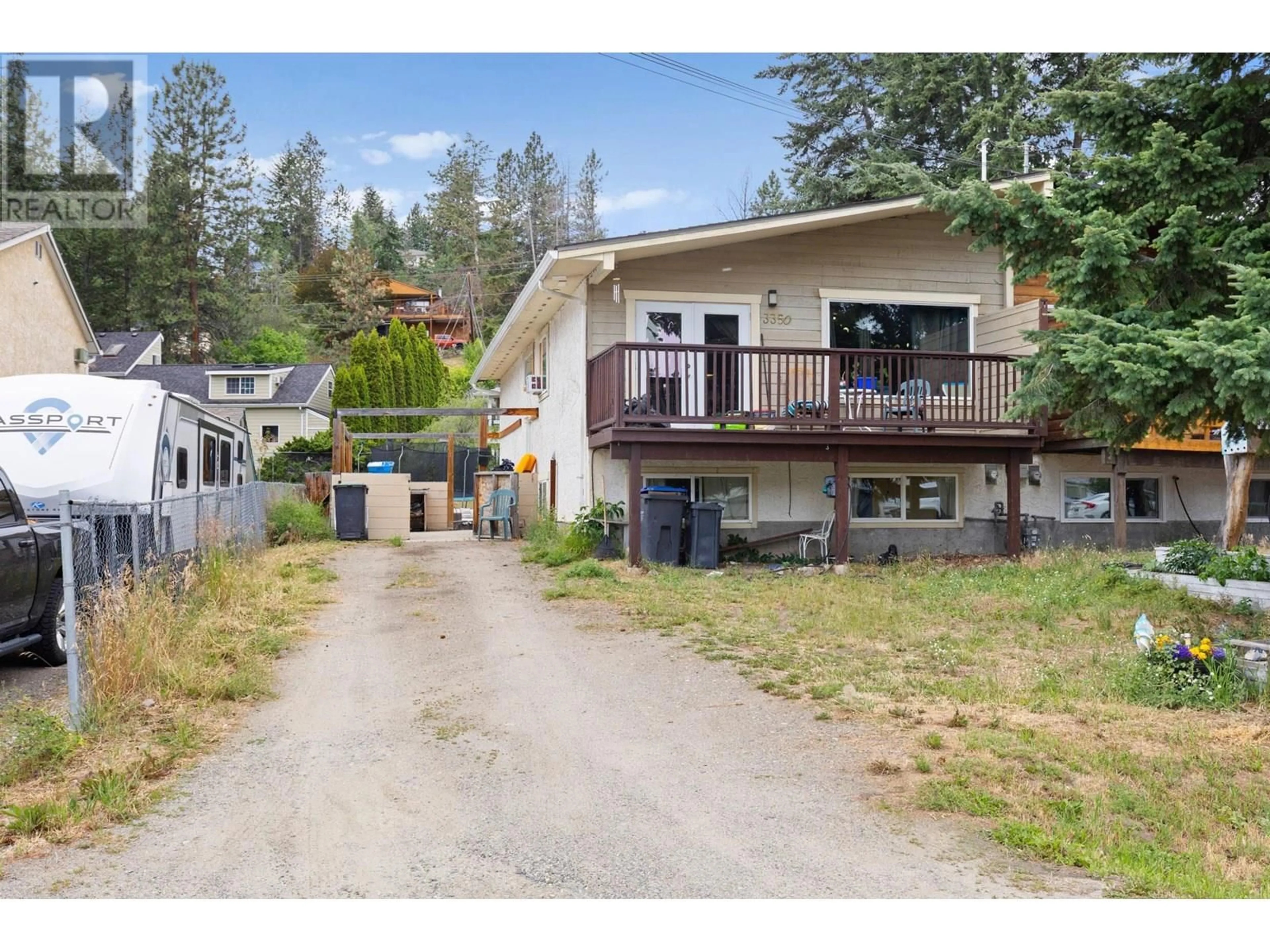 A pic from outside/outdoor area/front of a property/back of a property/a pic from drone, street for 3350 MCMILLAN ROAD, West Kelowna British Columbia V4T1H1