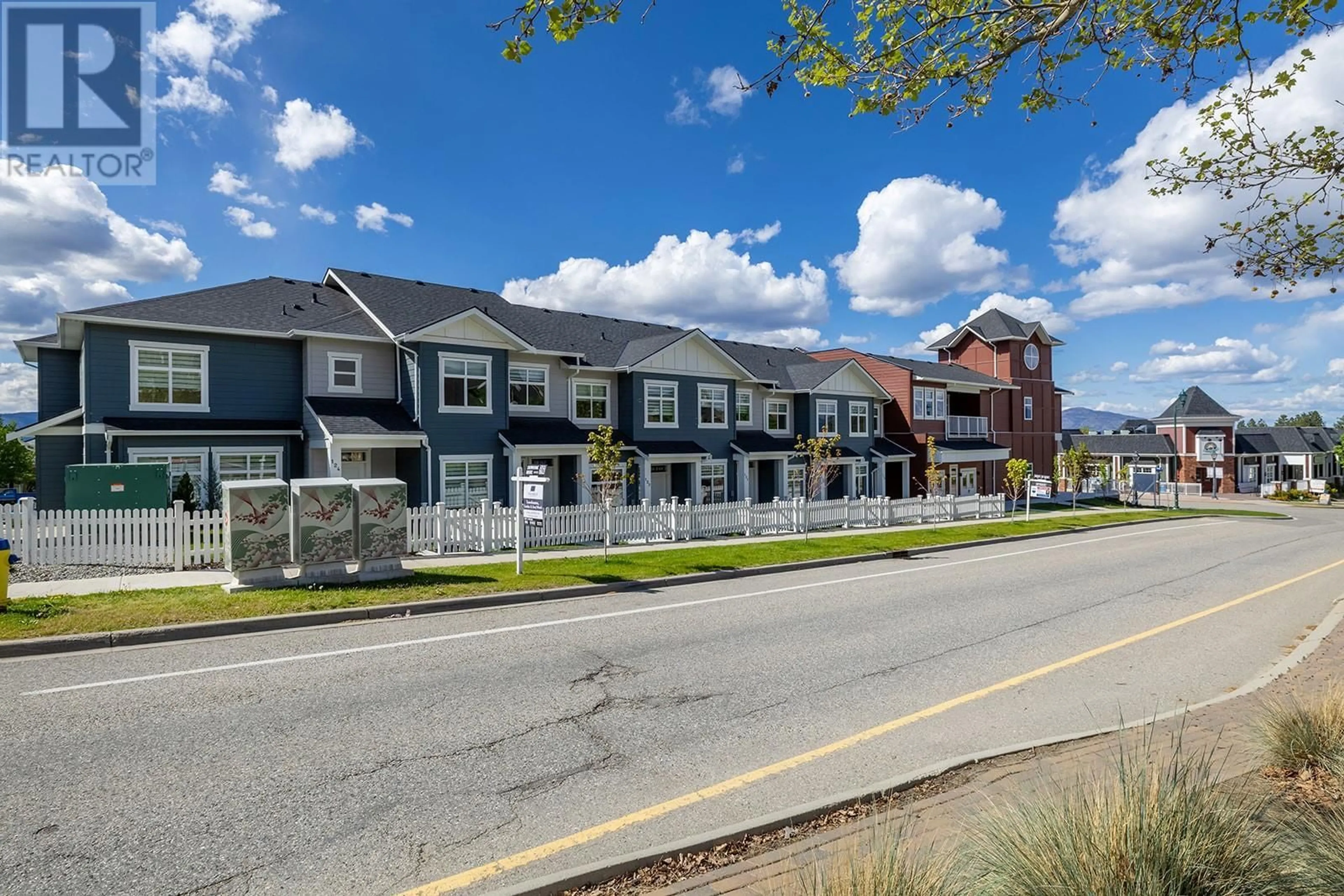 A pic from outside/outdoor area/front of a property/back of a property/a pic from drone, street for 121 - 5300 MAIN STREET, Kelowna British Columbia V1W0C1
