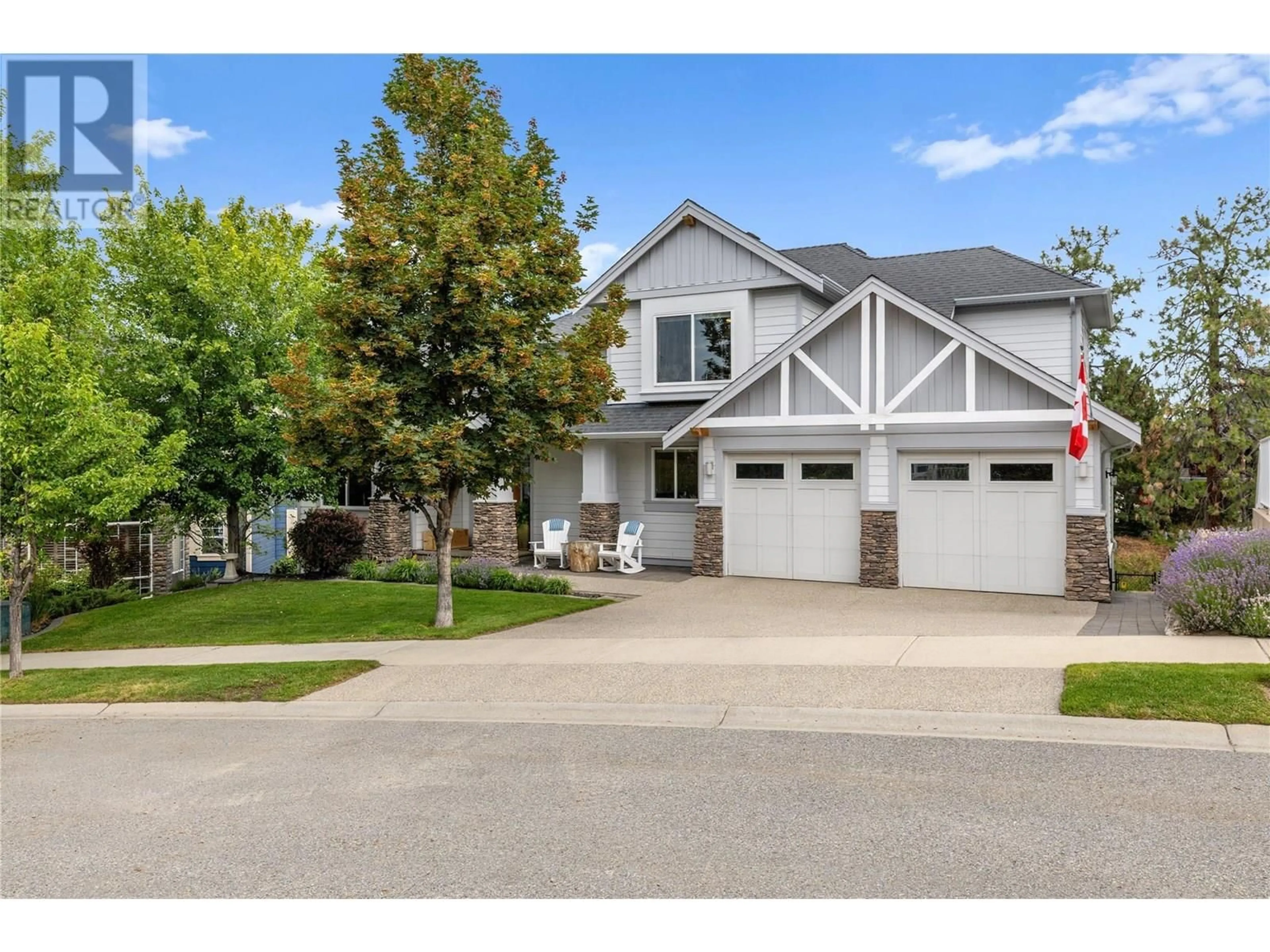 Home with vinyl exterior material, street for 404 QUILCHENA CRESCENT, Kelowna British Columbia V1W4W4