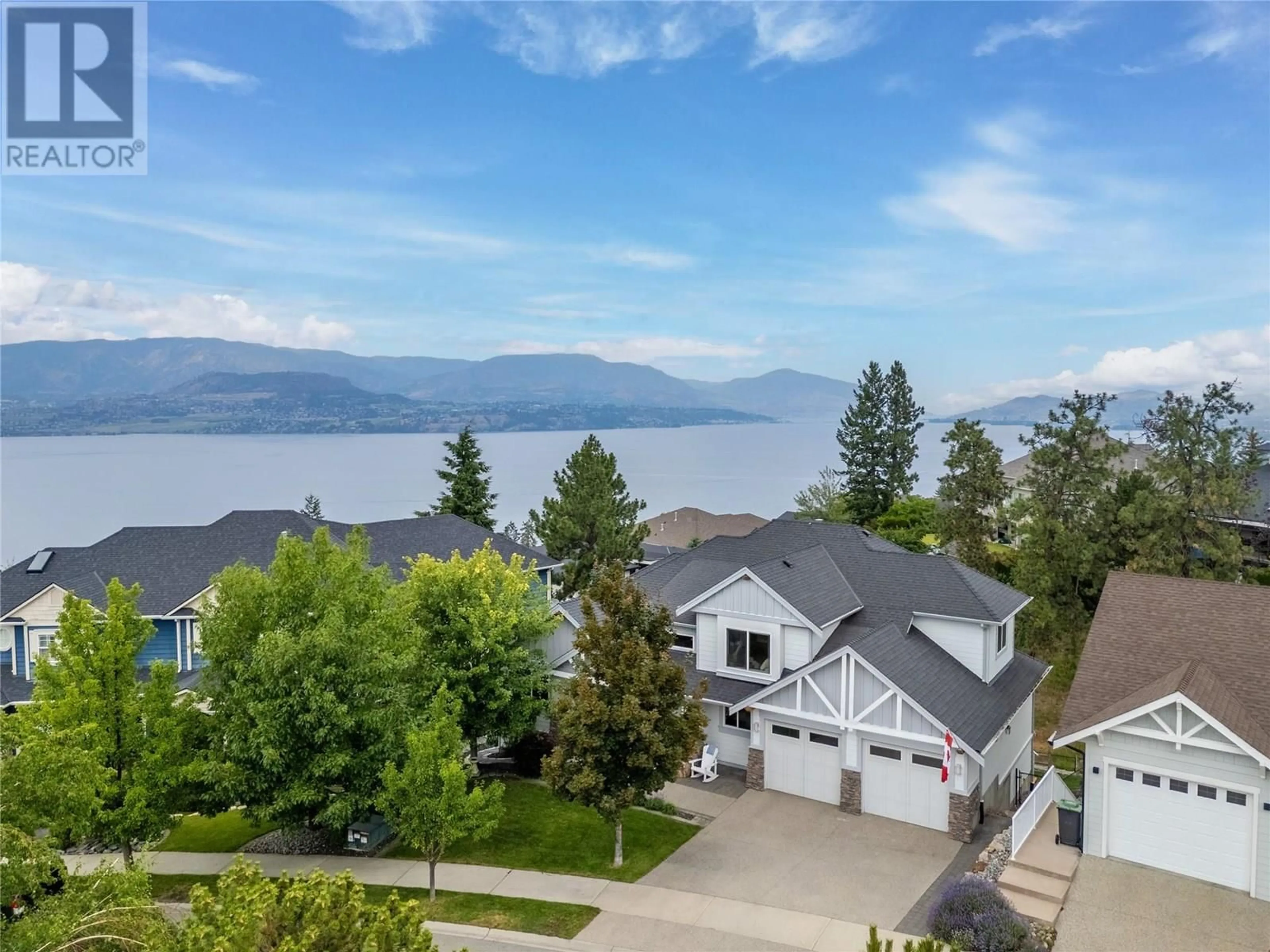 A pic from outside/outdoor area/front of a property/back of a property/a pic from drone, water/lake/river/ocean view for 404 QUILCHENA CRESCENT, Kelowna British Columbia V1W4W4