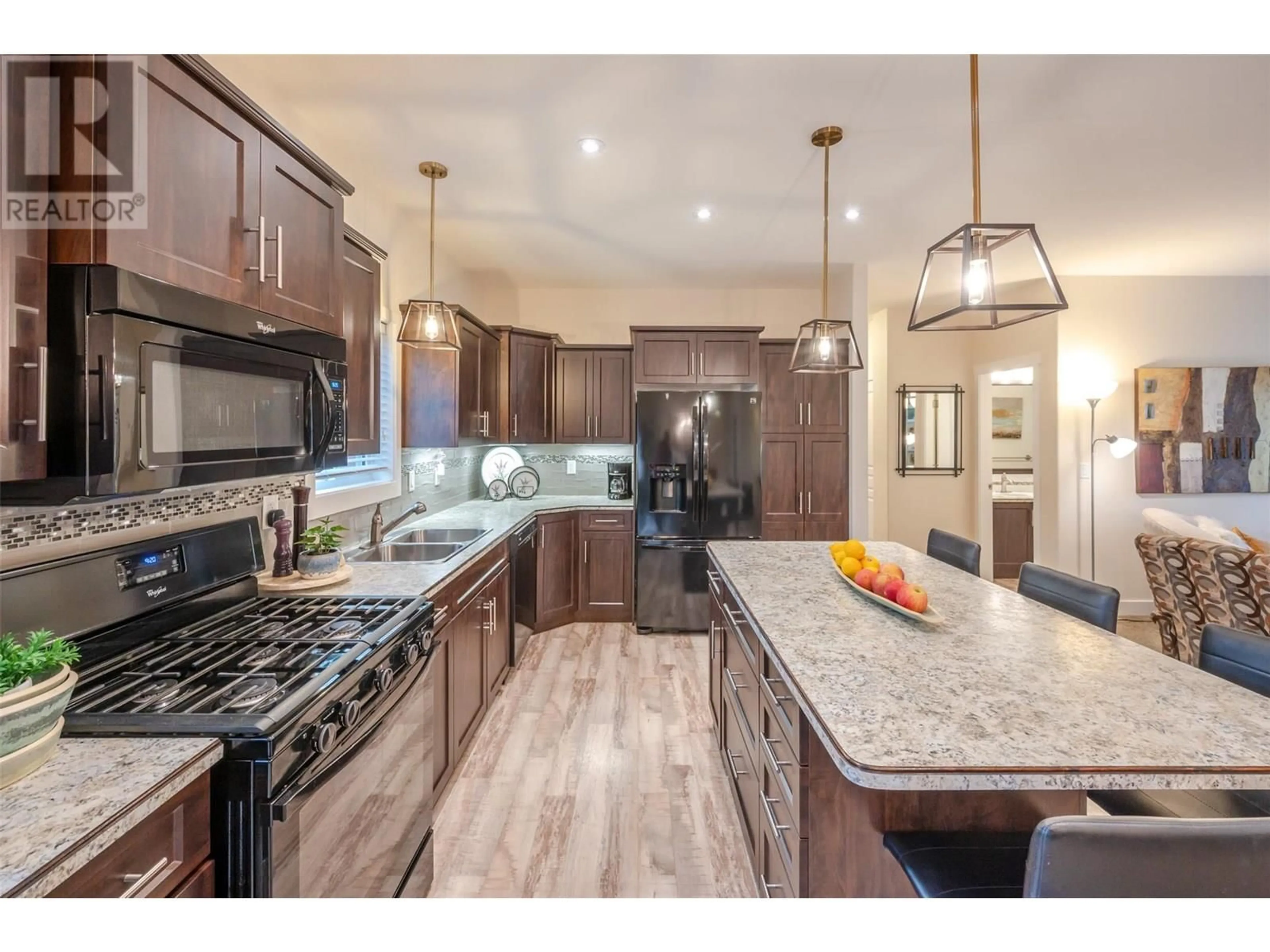 Open concept kitchen, ceramic/tile floor for 84 - 8300 GALLAGHER LAKE FRONTAGE ROAD, Oliver British Columbia V0H1T2