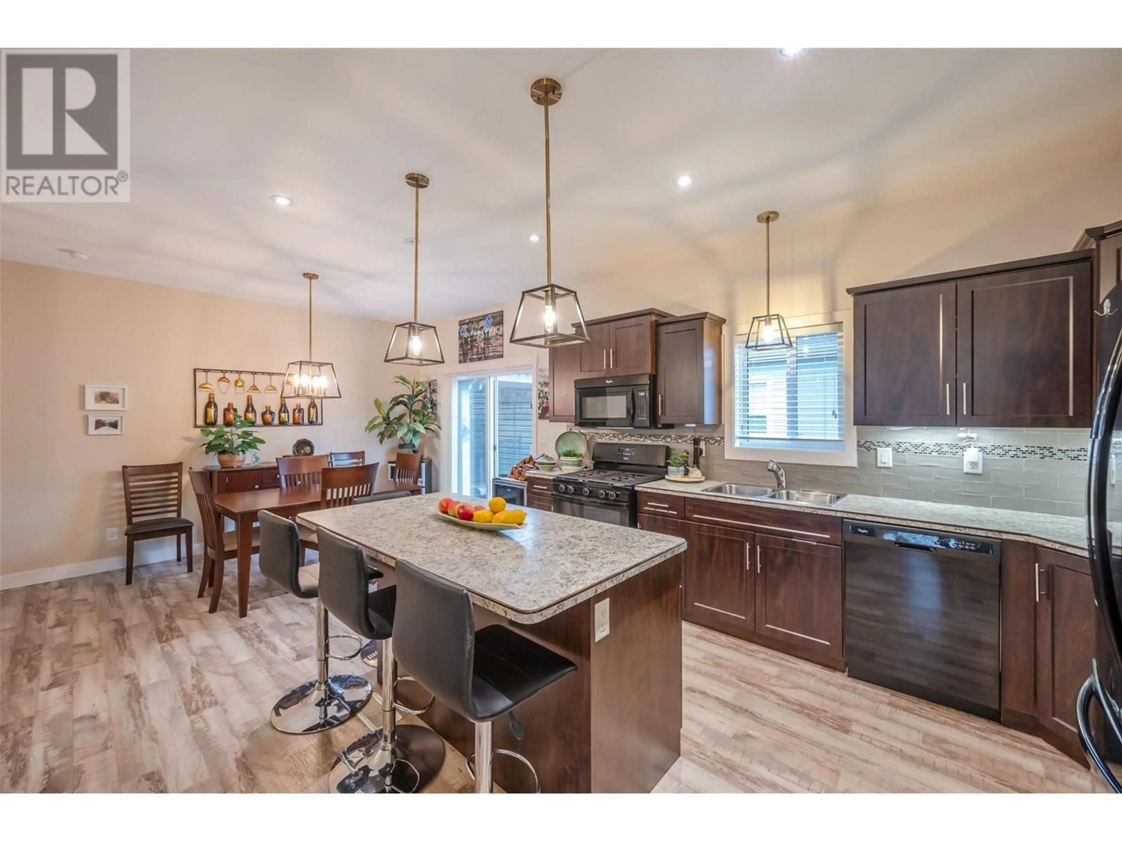 Open concept kitchen, ceramic/tile floor for 84 - 8300 GALLAGHER LAKE FRONTAGE ROAD, Oliver British Columbia V0H1T2