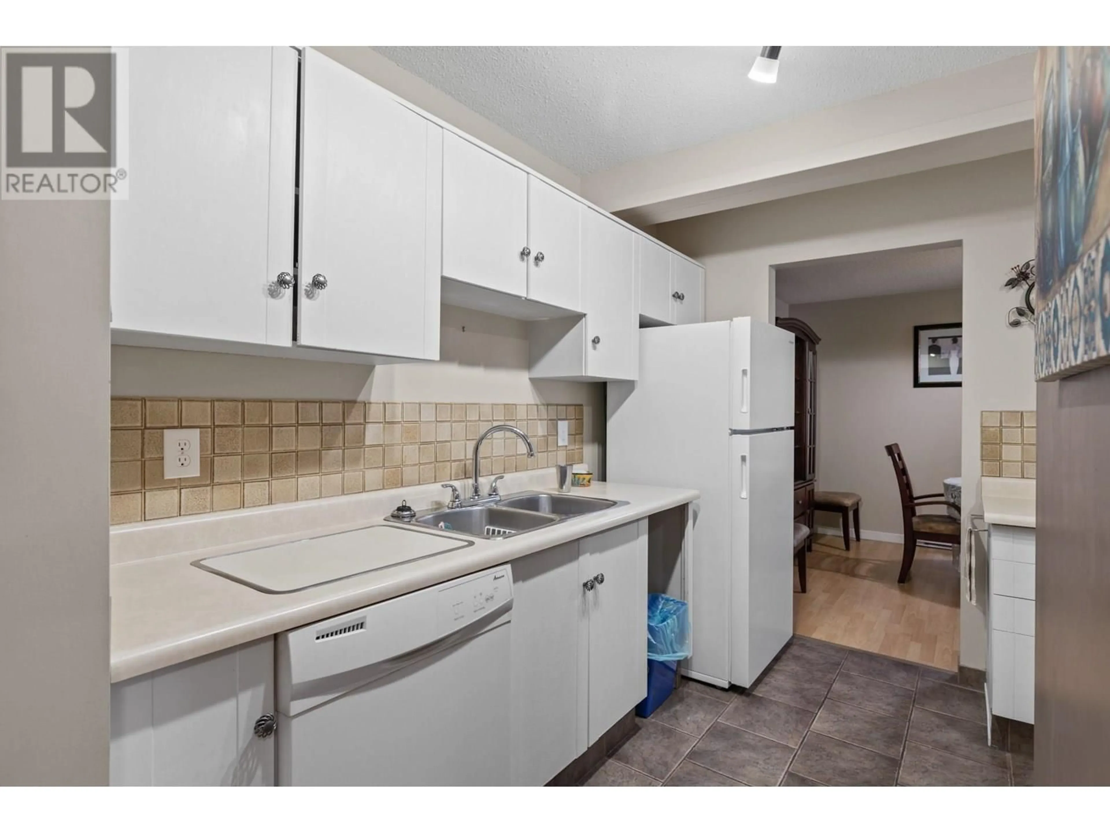 Standard kitchen, ceramic/tile floor for 108 - 1035 BERNARD AVENUE, Kelowna British Columbia V1Y6P7