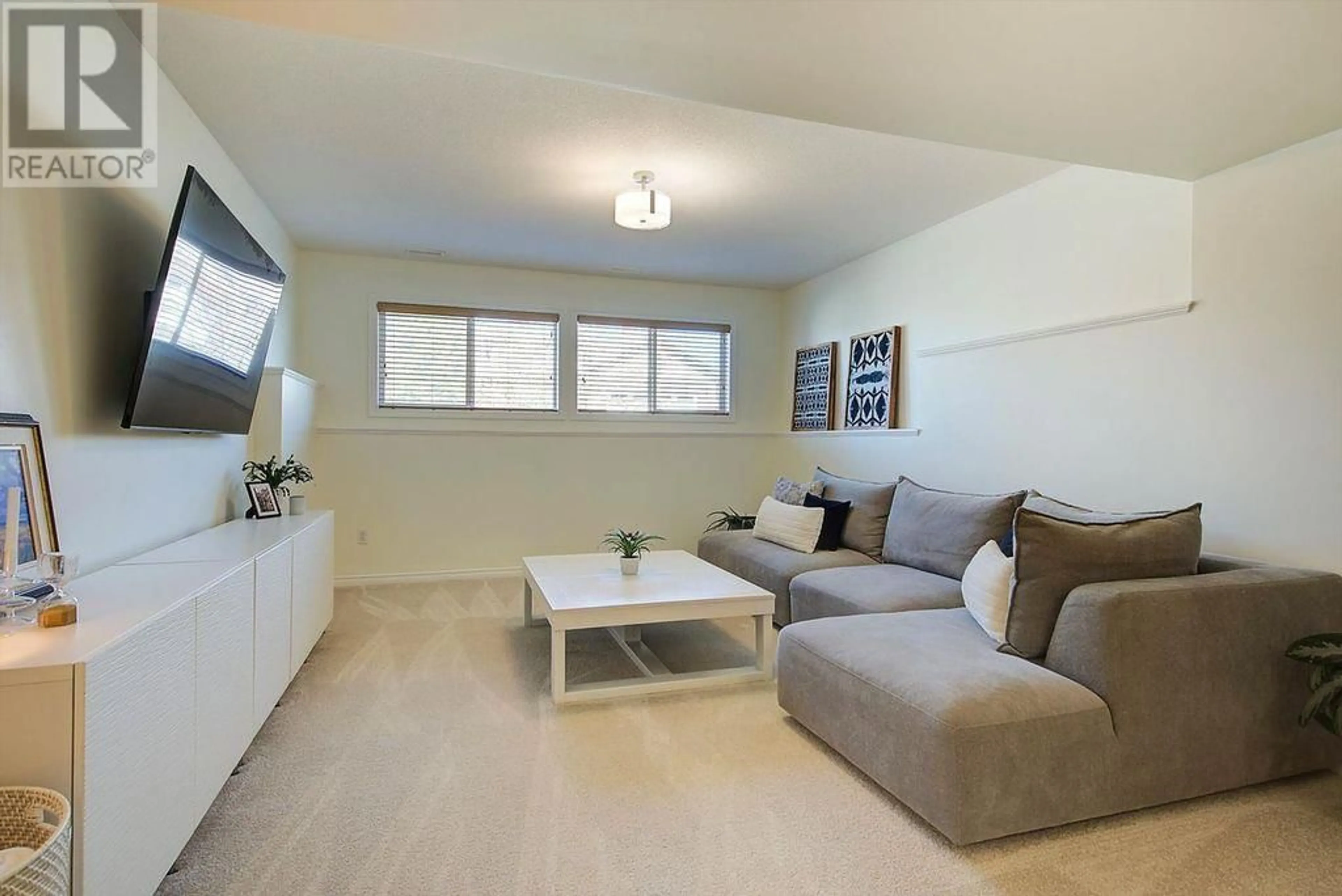 Living room with furniture, unknown for 812 KUIPERS CRESCENT, Kelowna British Columbia V1W5C9