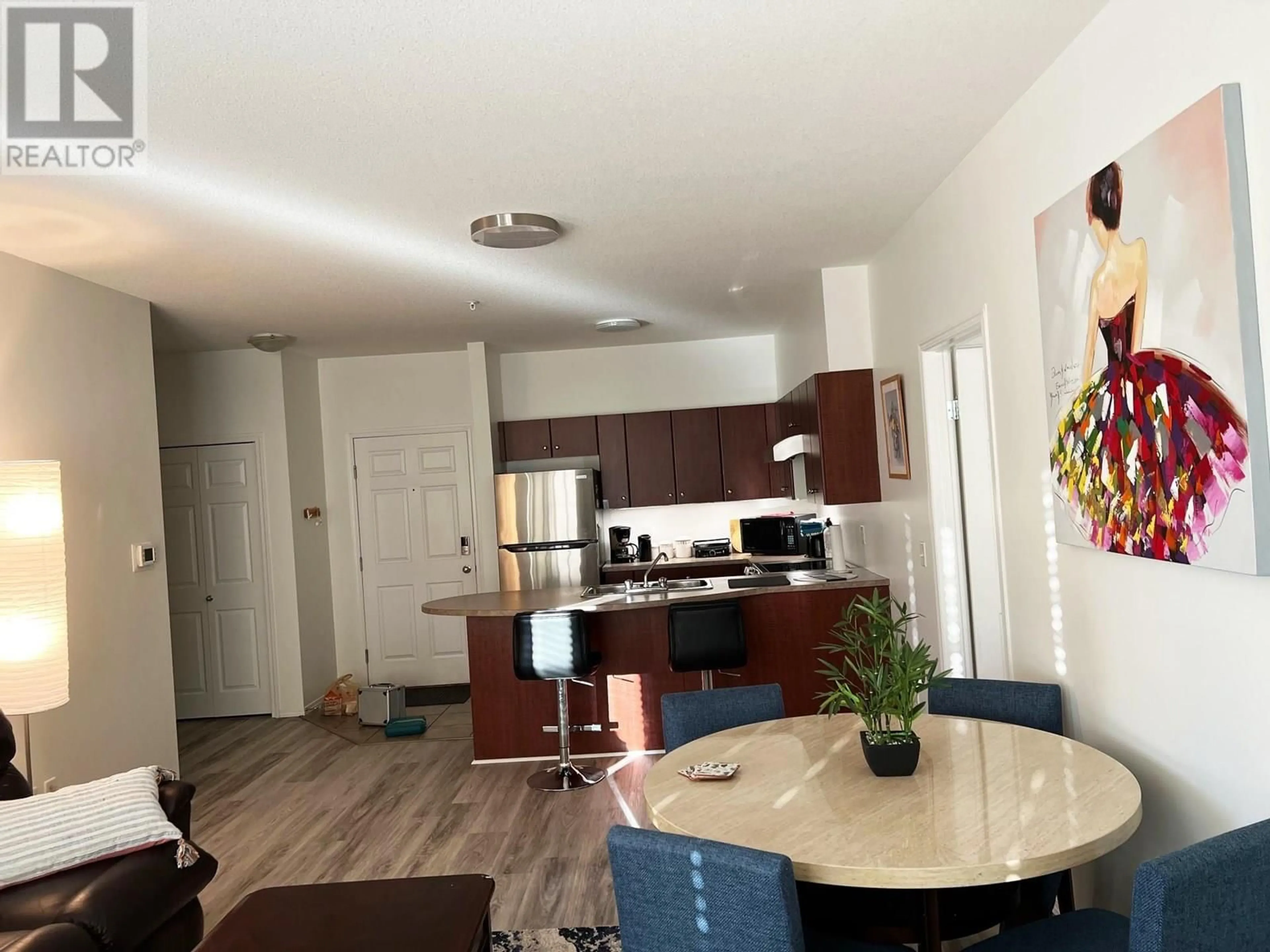 Open concept kitchen, wood/laminate floor for 2415 - 1873 COUNTRY CLUB DRIVE, Kelowna British Columbia V1V2W7