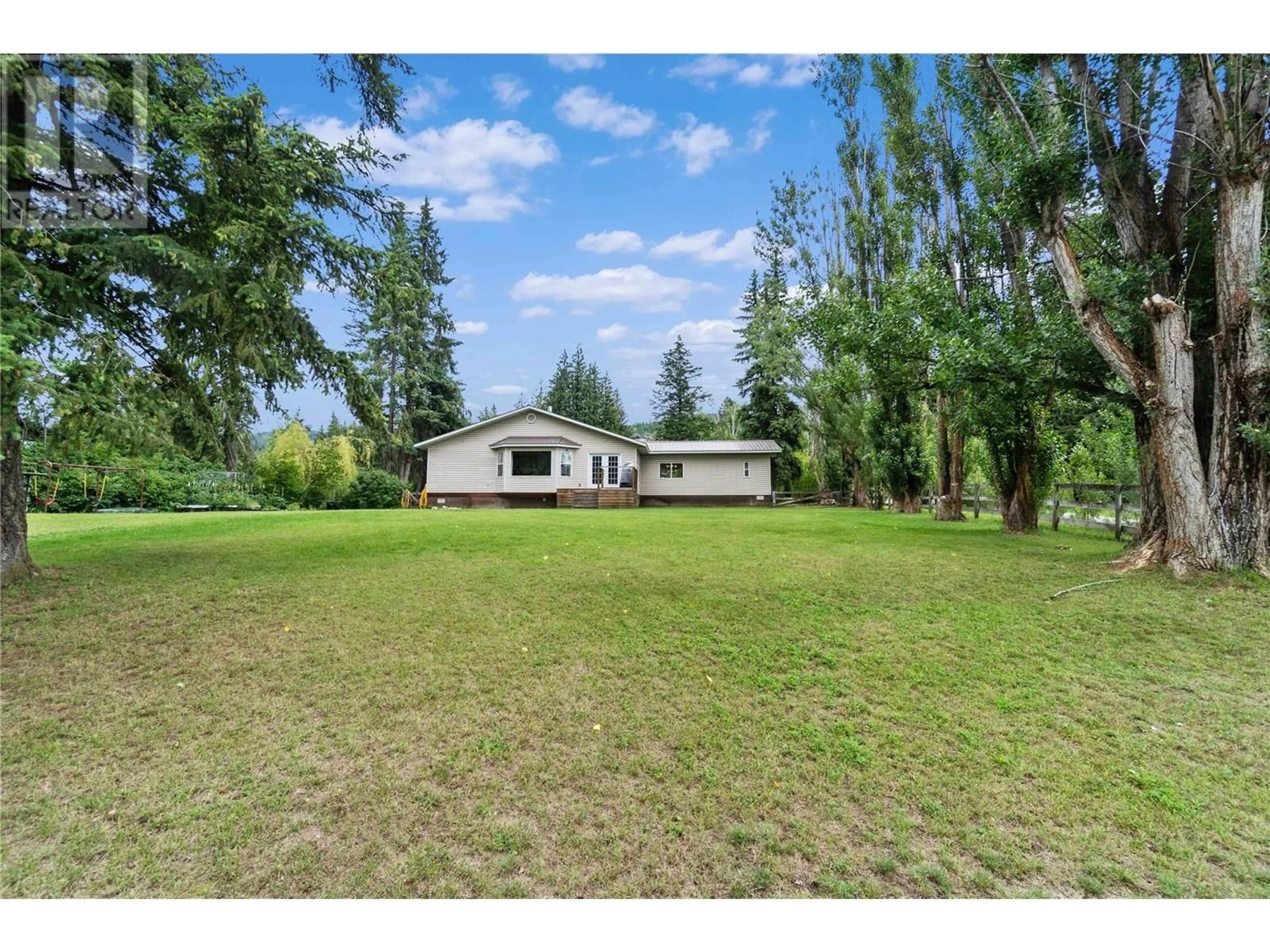 A pic from outside/outdoor area/front of a property/back of a property/a pic from drone, unknown for 6963 SONORA ROAD, Salmon Arm British Columbia V1E2Y5