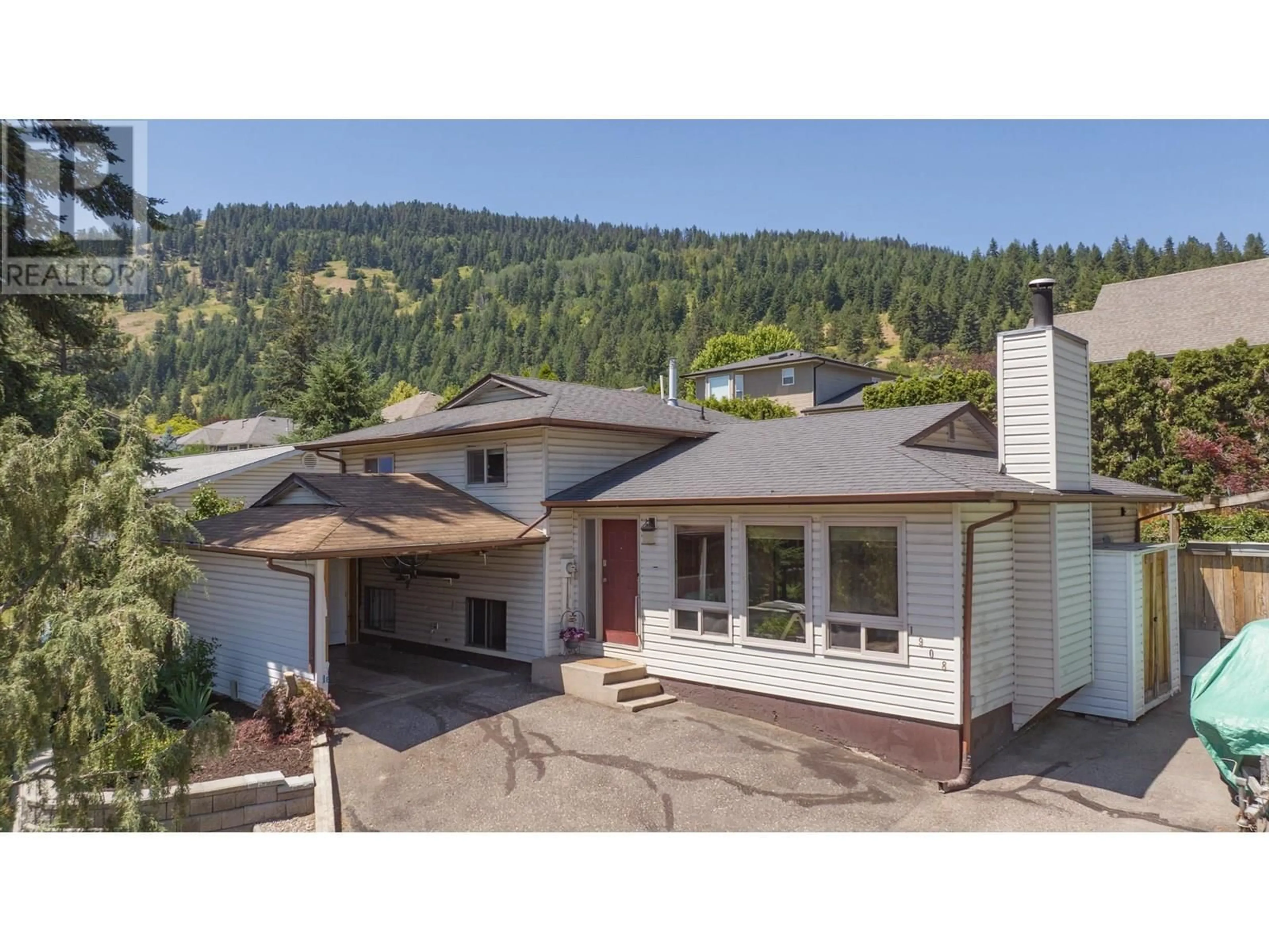 A pic from outside/outdoor area/front of a property/back of a property/a pic from drone, mountain view for 1908 SADDLEVIEW AVENUE, Lumby British Columbia V0E2G0