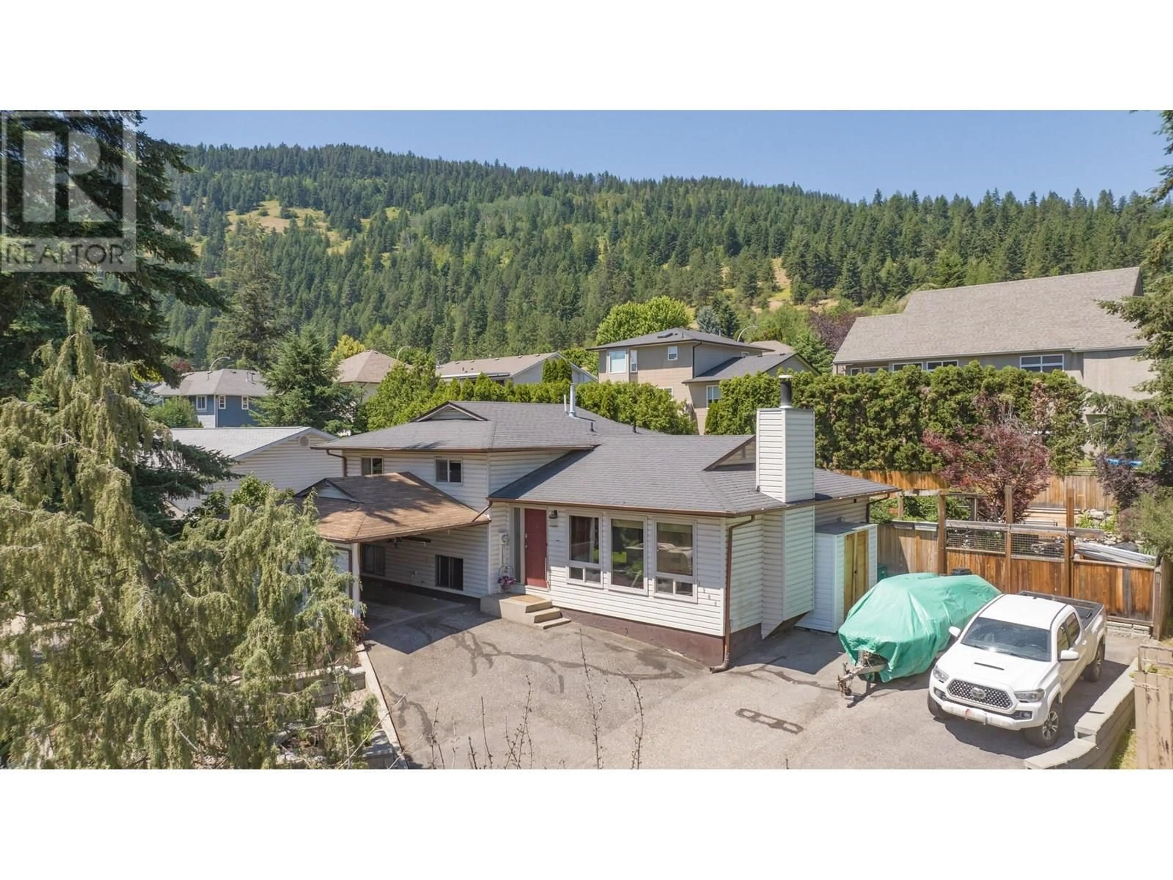 A pic from outside/outdoor area/front of a property/back of a property/a pic from drone, mountain view for 1908 SADDLEVIEW AVENUE, Lumby British Columbia V0E2G0