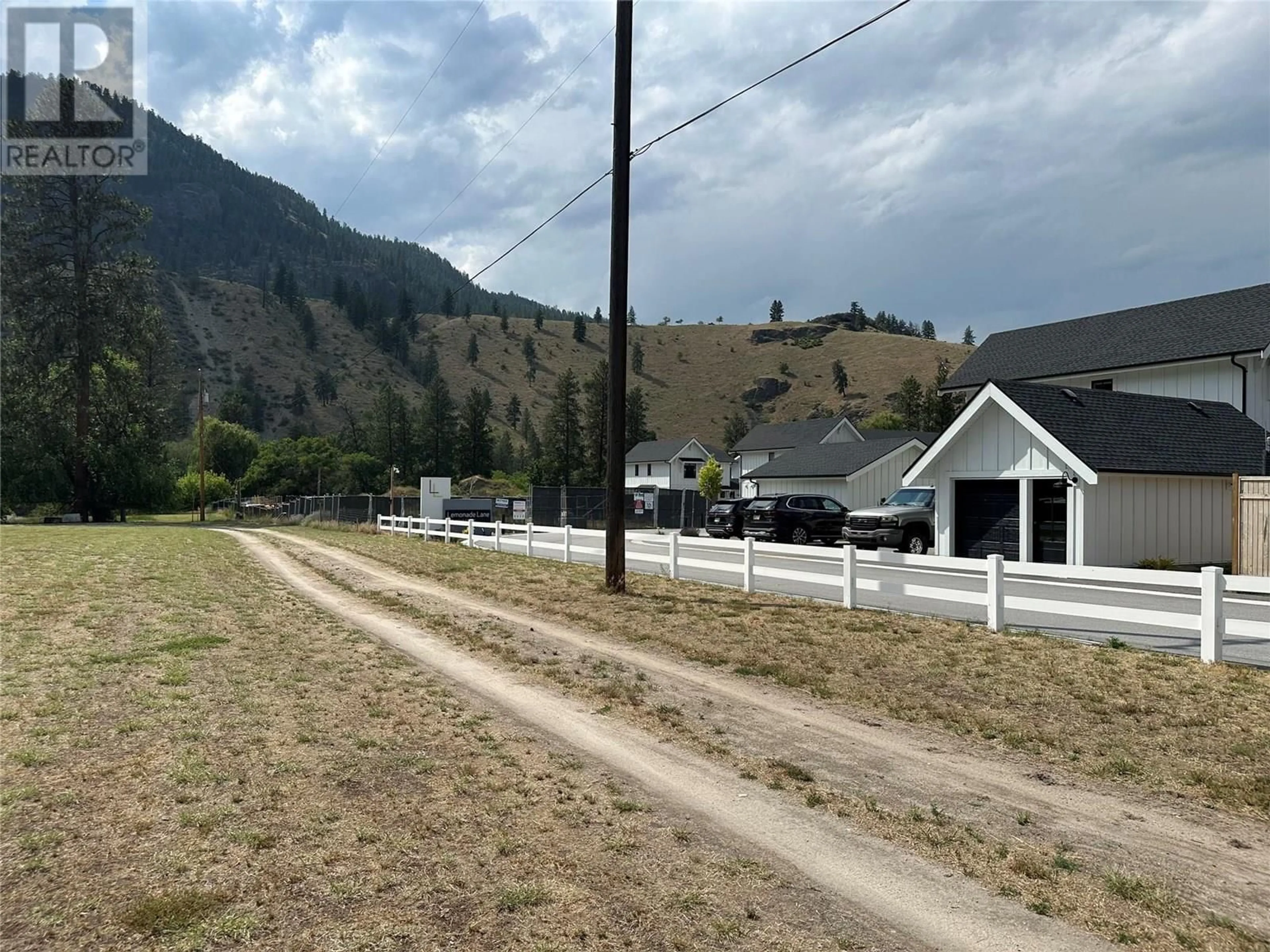 A pic from outside/outdoor area/front of a property/back of a property/a pic from drone, mountain view for 1348 CEDAR STREET, Okanagan Falls British Columbia V0H1R0