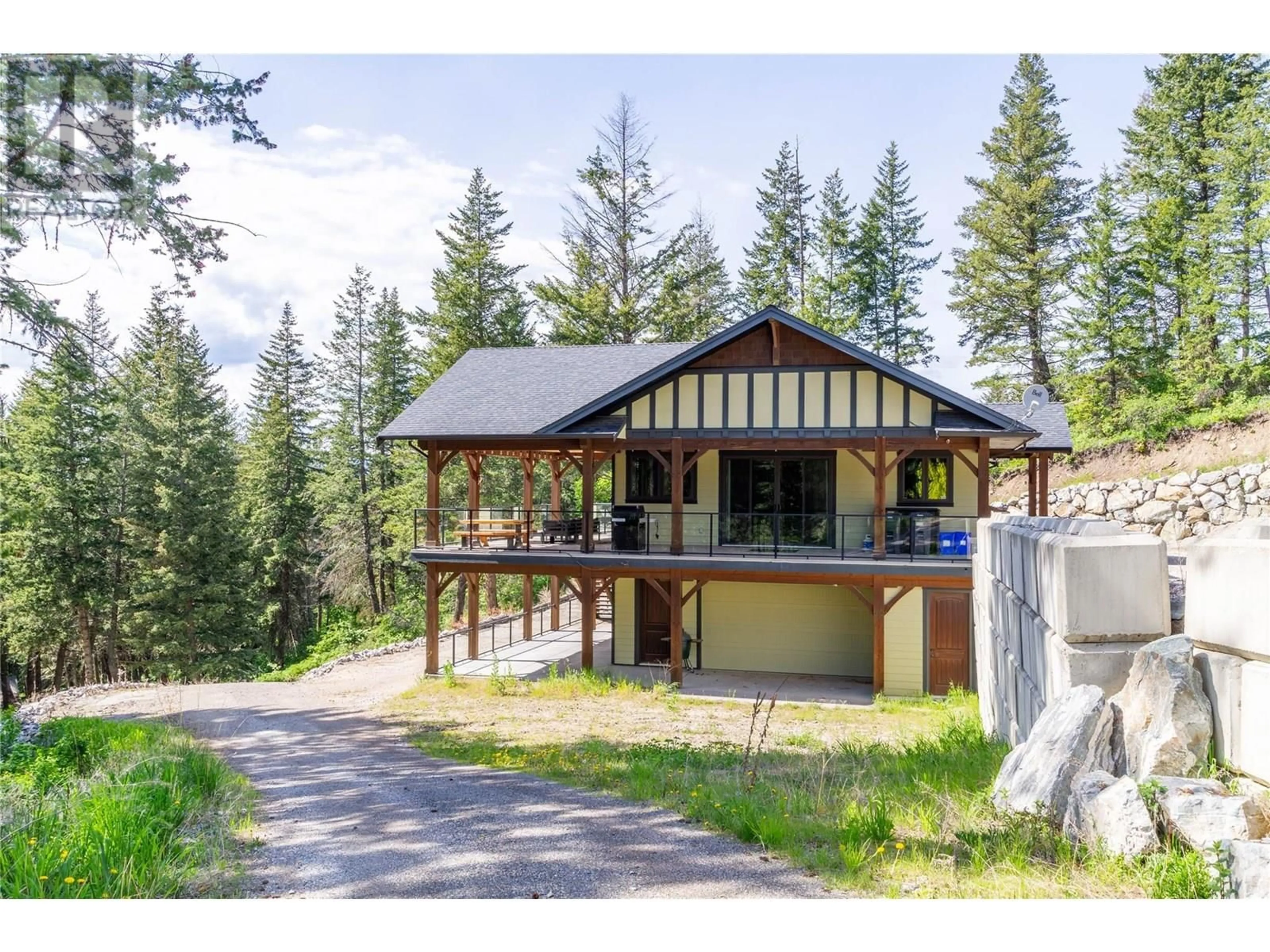 A pic from outside/outdoor area/front of a property/back of a property/a pic from drone, mountain view for 6080 LYNX DRIVE, Vernon British Columbia V1B3J5