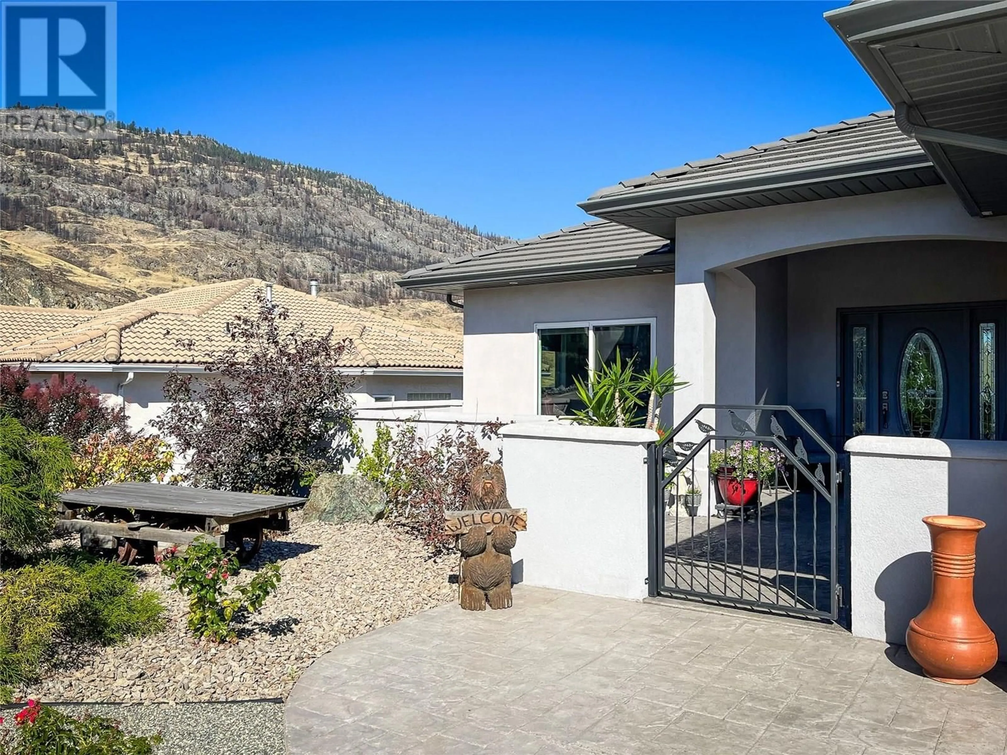 Home with vinyl exterior material, mountain view for 11907 OLYMPIC VIEW DRIVE, Osoyoos British Columbia V0H1V4