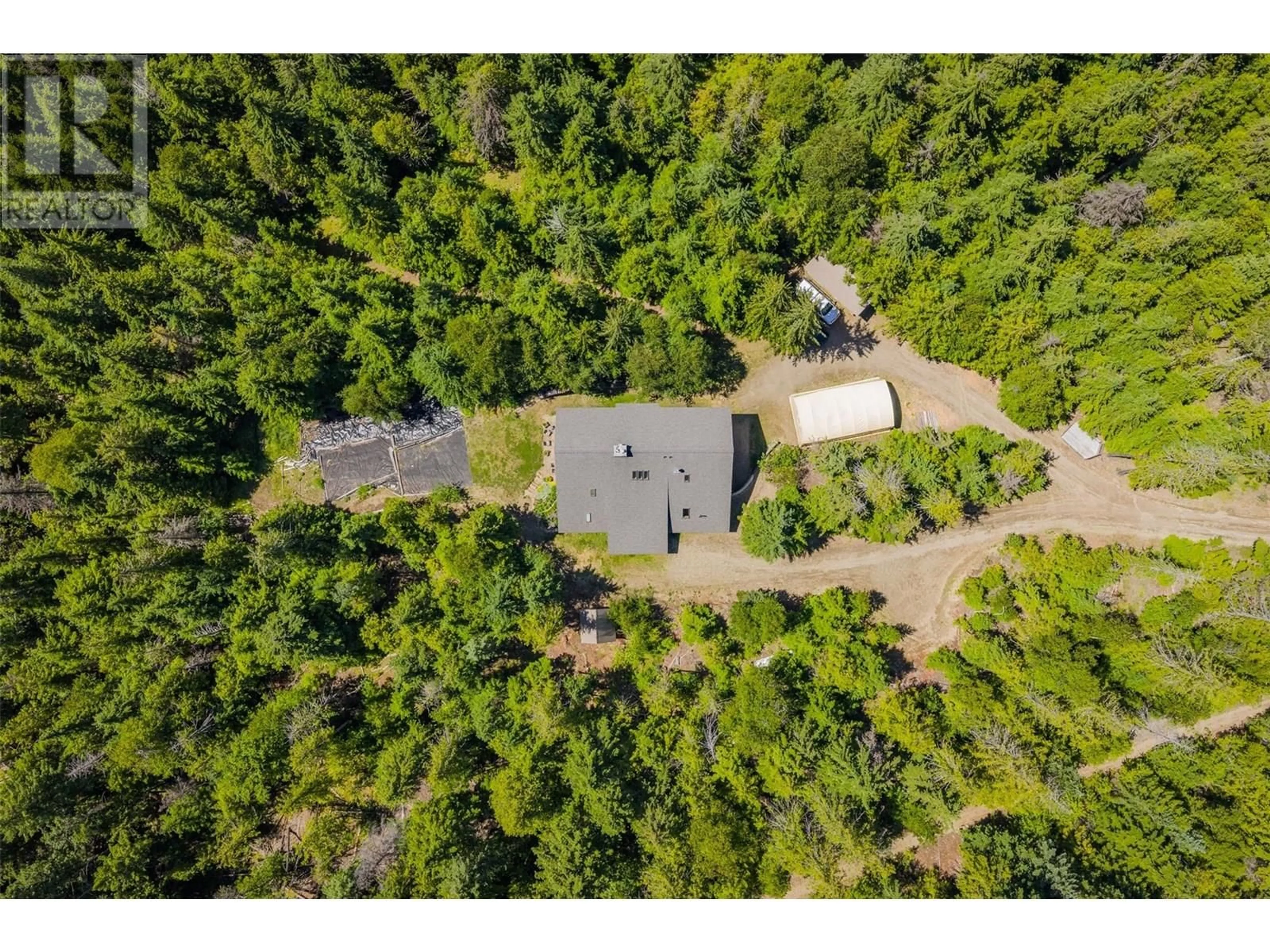 A pic from outside/outdoor area/front of a property/back of a property/a pic from drone, forest/trees view for 282 DUNCAN DAM SITE HAUL ROAD, Meadow Creek British Columbia V0G1N0