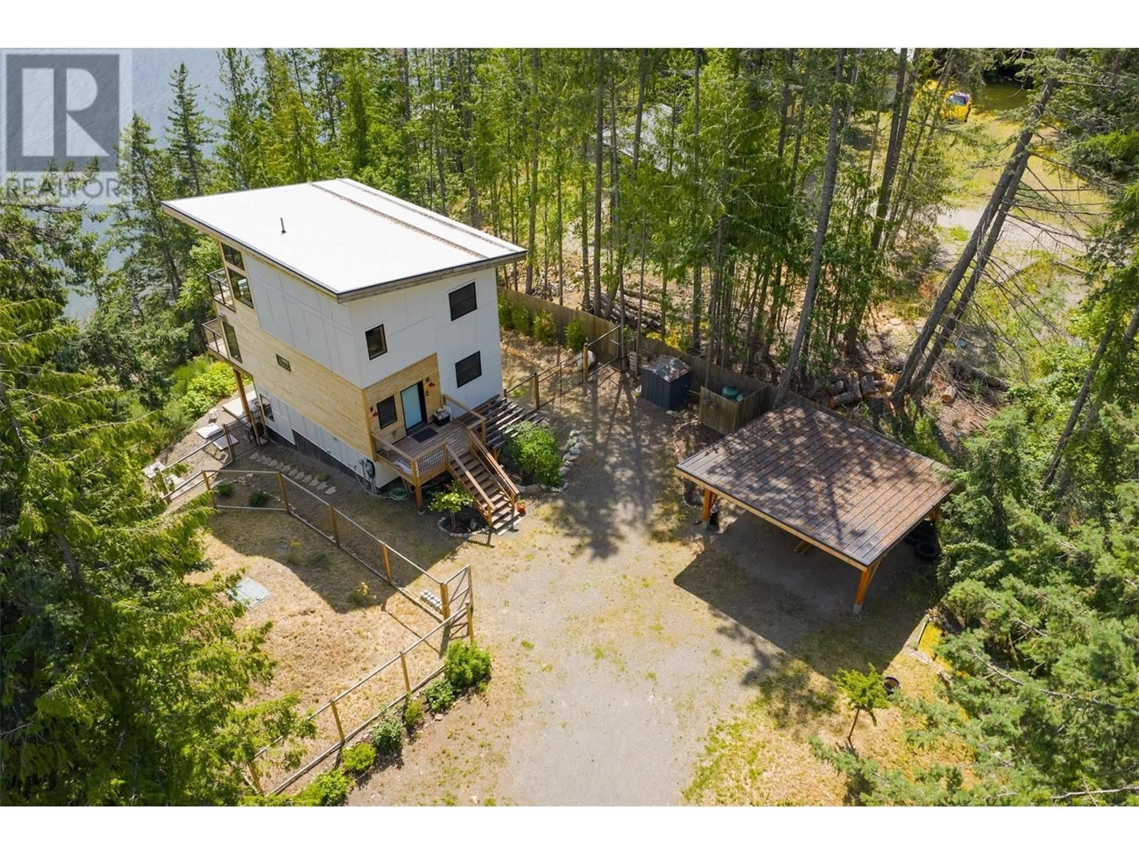 A pic from outside/outdoor area/front of a property/back of a property/a pic from drone, water/lake/river/ocean view for 5336 AMUNDSEN ROAD, Kaslo British Columbia V0G1Y0