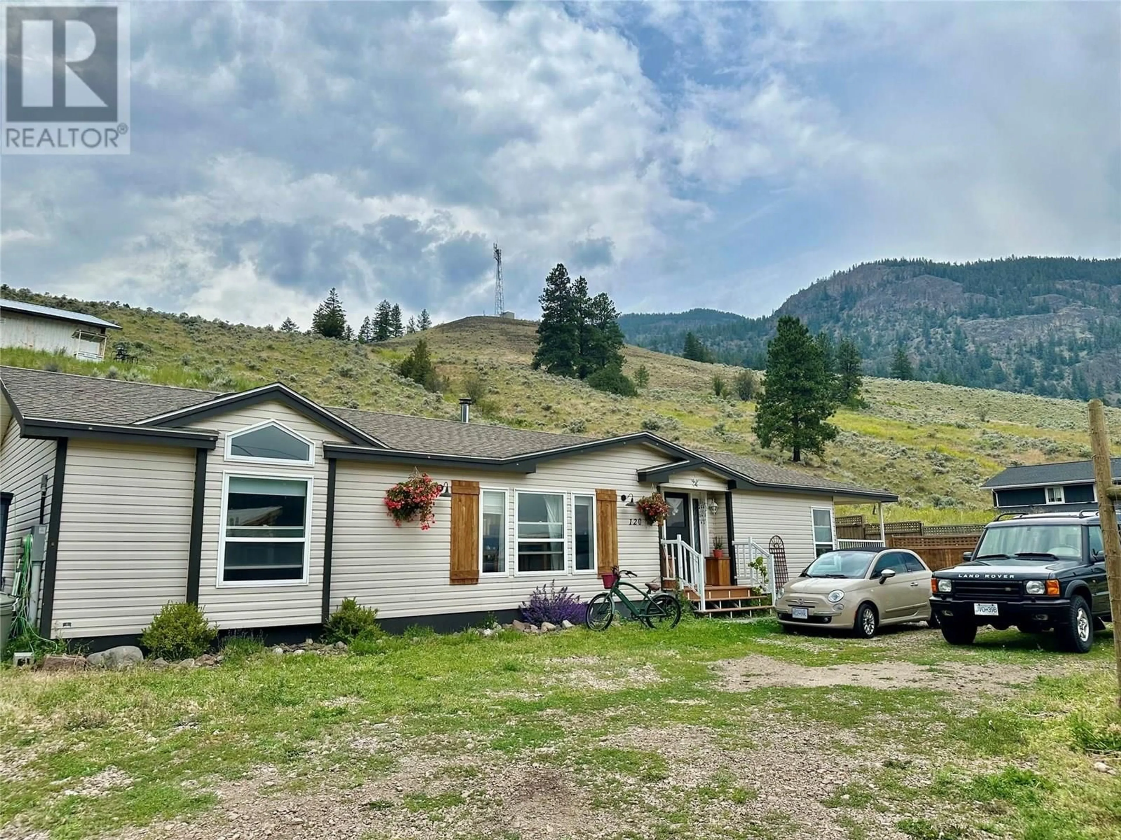 A pic from outside/outdoor area/front of a property/back of a property/a pic from drone, mountain view for 120 RESOLUTE ROAD, Kaleden British Columbia V0H1K0