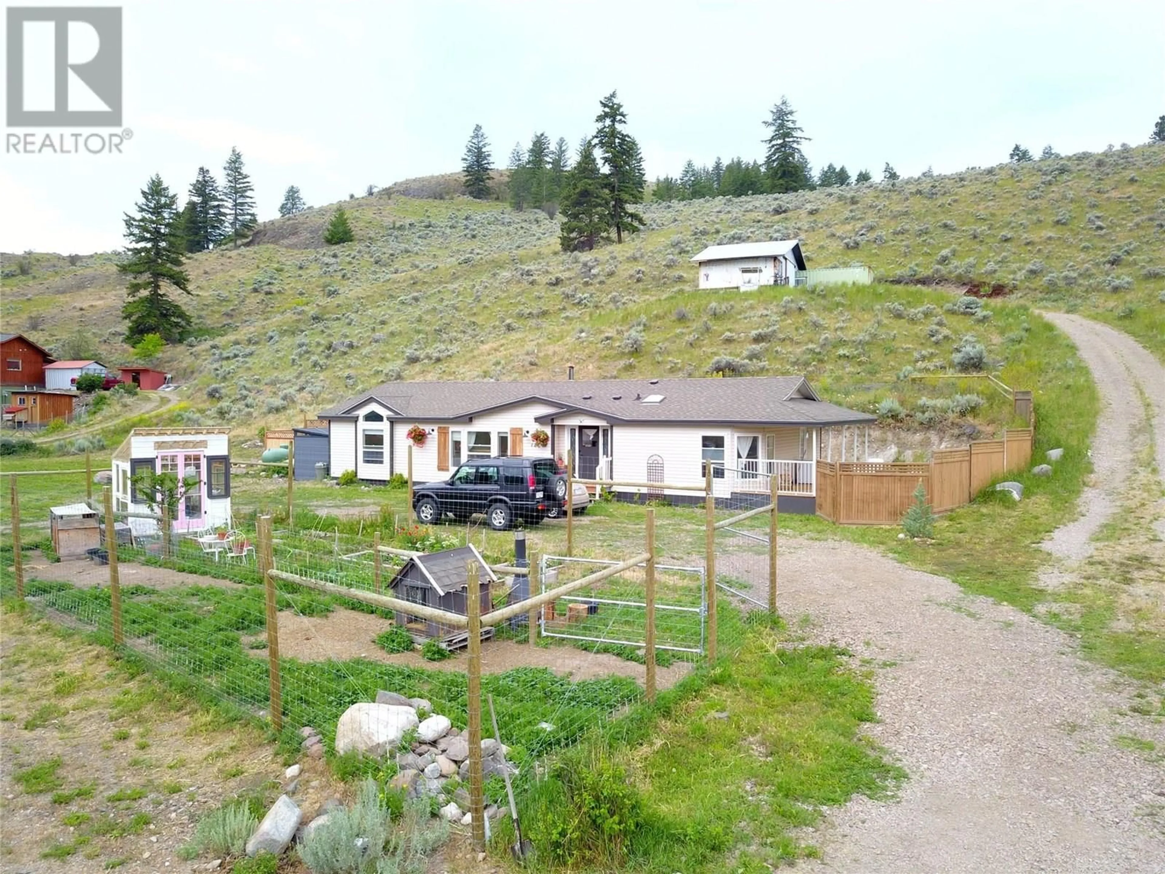 A pic from outside/outdoor area/front of a property/back of a property/a pic from drone, mountain view for 120 RESOLUTE ROAD, Kaleden British Columbia V0H1K0