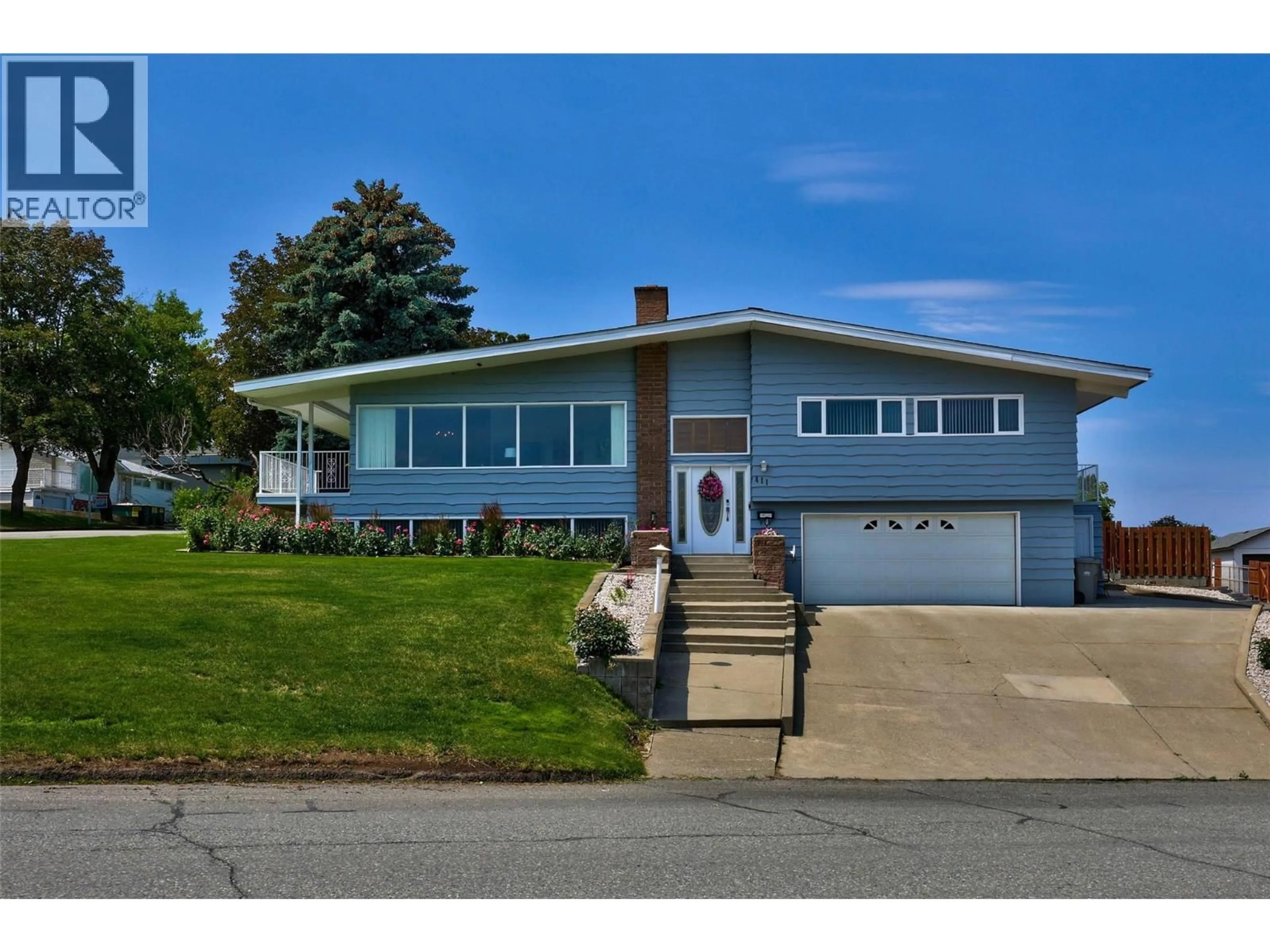 Home with vinyl exterior material, street for 411 STRATHCONA TERRACE, Kamloops British Columbia V2C1C2