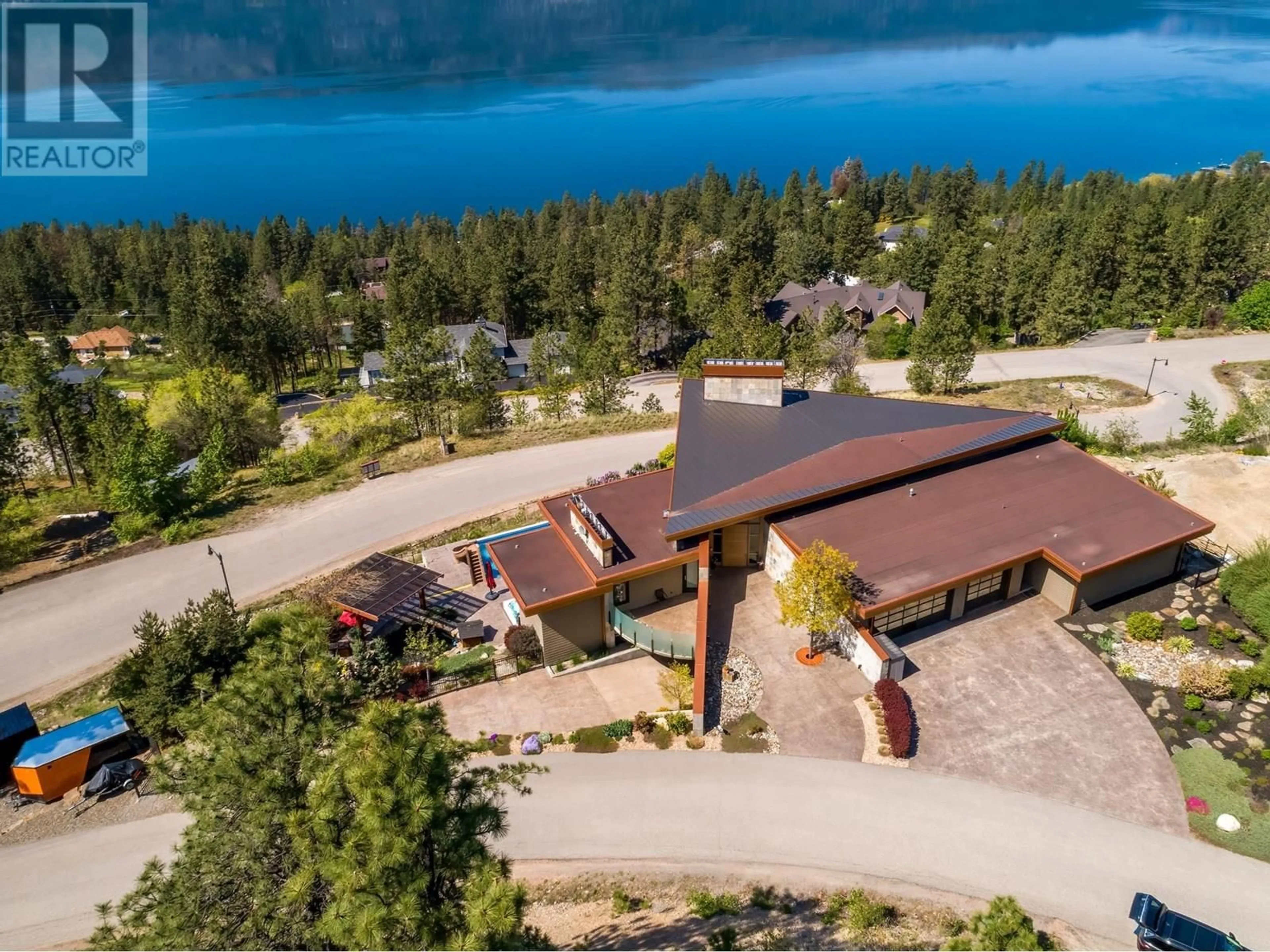 A pic from outside/outdoor area/front of a property/back of a property/a pic from drone, water/lake/river/ocean view for 13889 OGILVEY LANE, Lake Country British Columbia V4V2S8