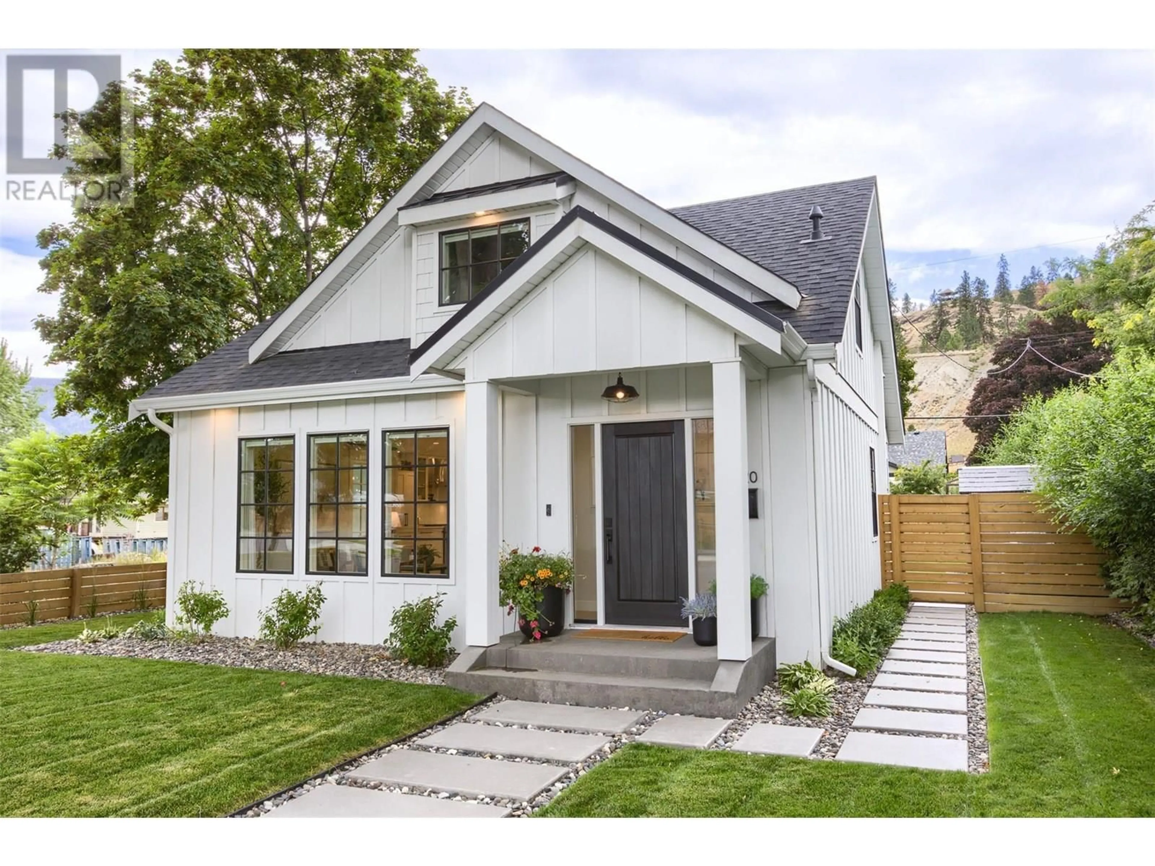 Home with brick exterior material, street for 620 CAMBRIDGE AVENUE, Kelowna British Columbia V1Y7M6