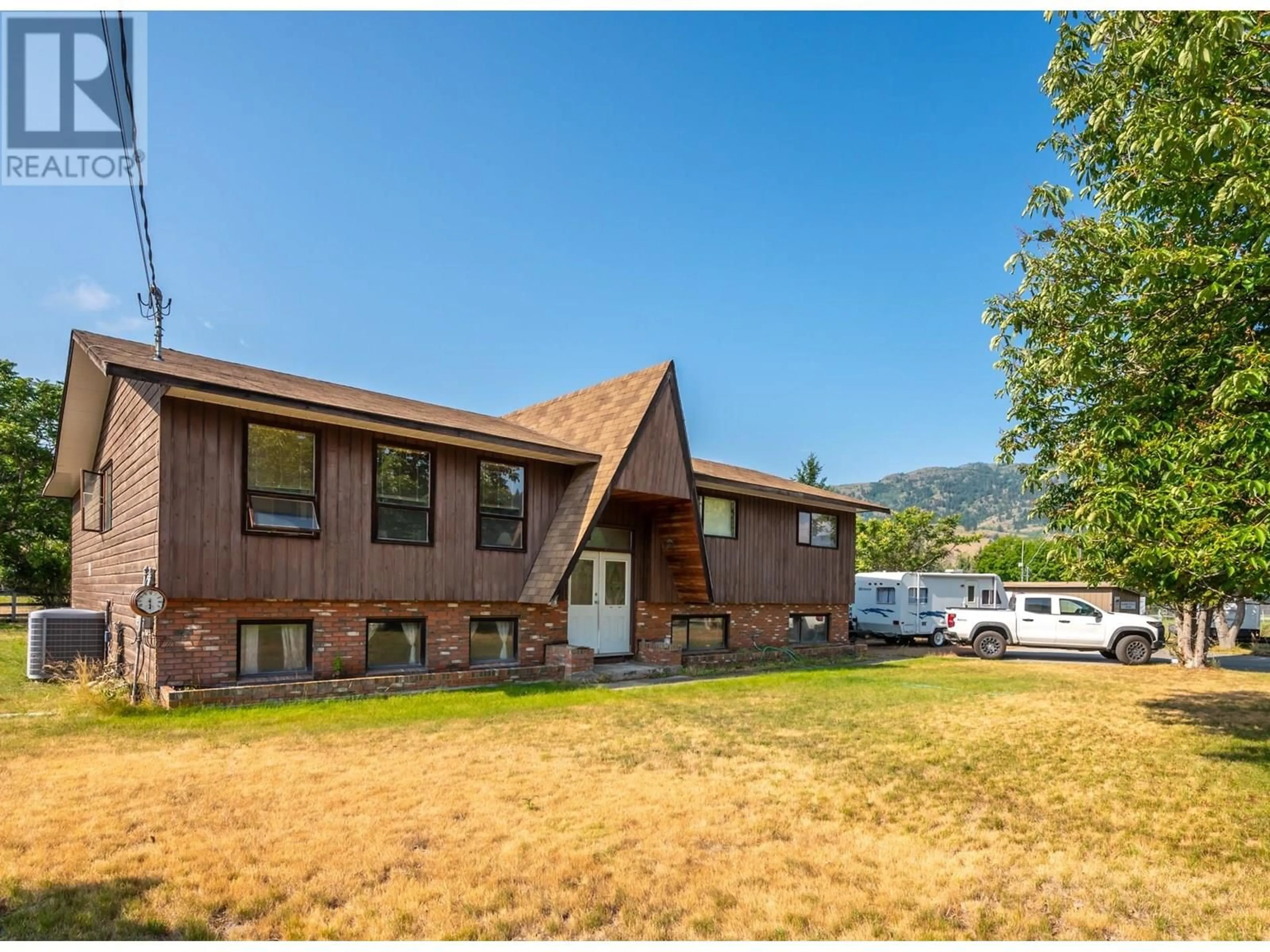 Home with vinyl exterior material, mountain view for 181 CARR CRESCENT, Oliver British Columbia V0H1T5