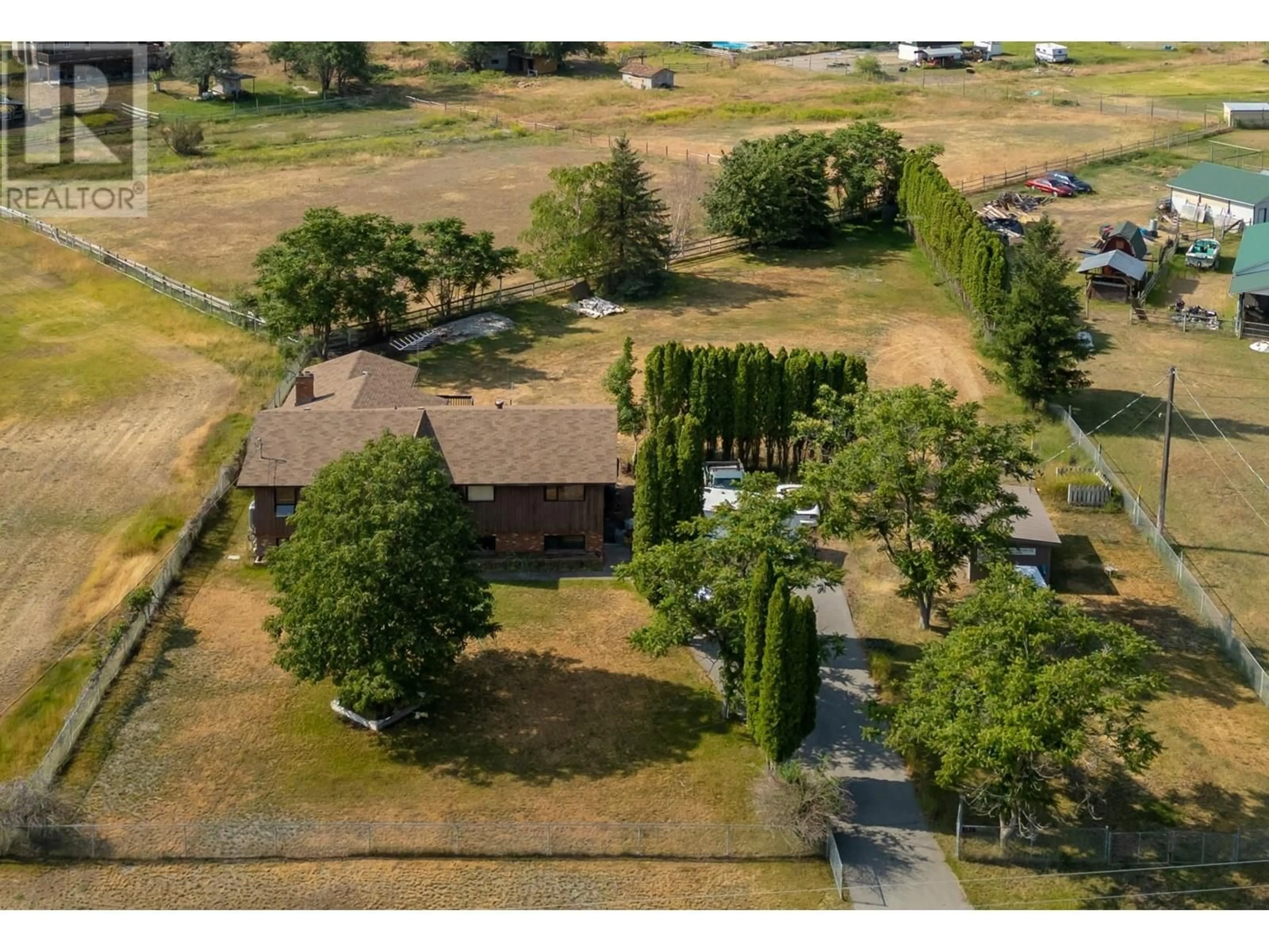 A pic from outside/outdoor area/front of a property/back of a property/a pic from drone, unknown for 181 CARR CRESCENT, Oliver British Columbia V0H1T5