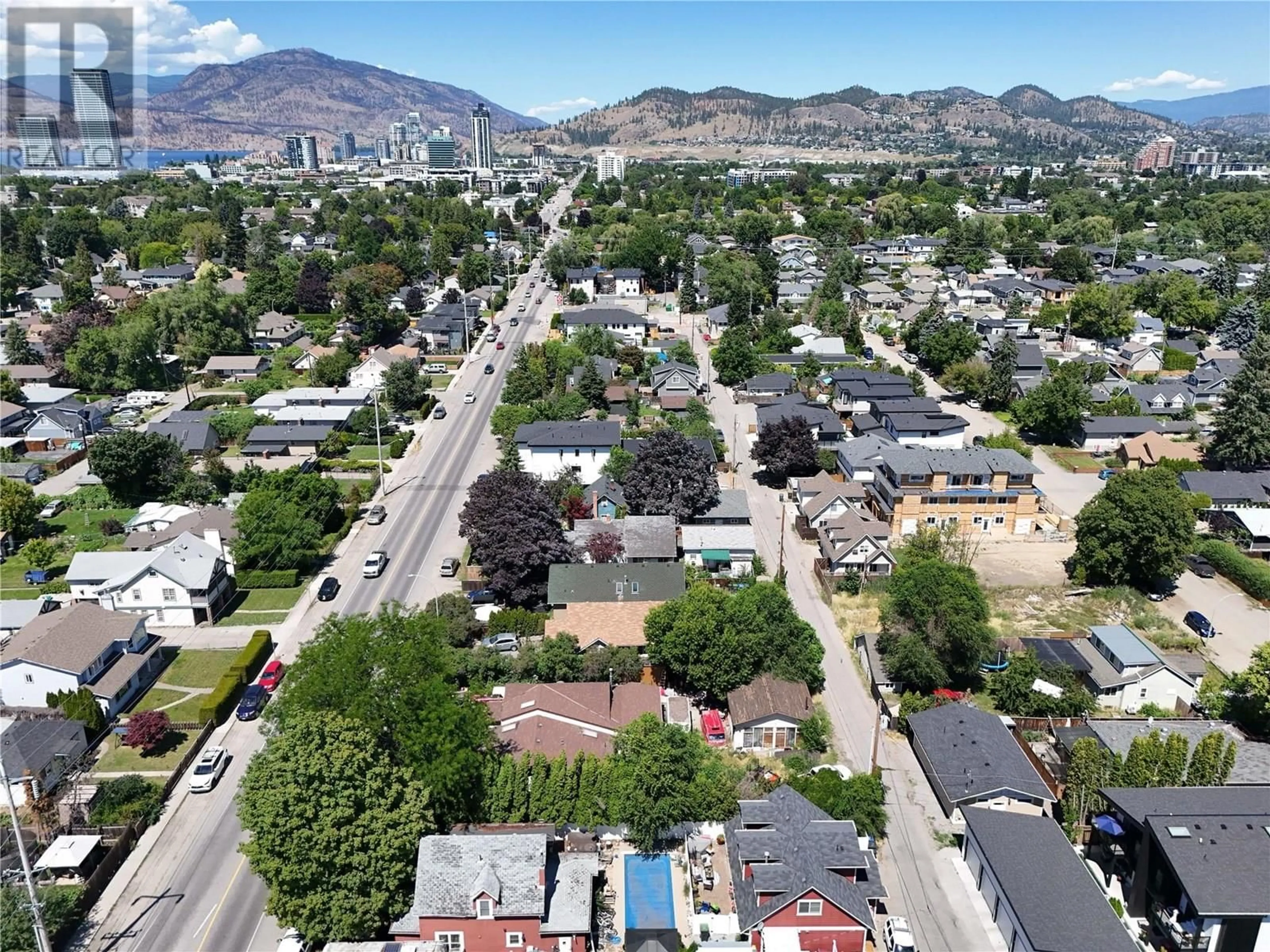 A pic from outside/outdoor area/front of a property/back of a property/a pic from drone, mountain view for 2253 RICHTER STREET, Kelowna British Columbia V1Y2N9