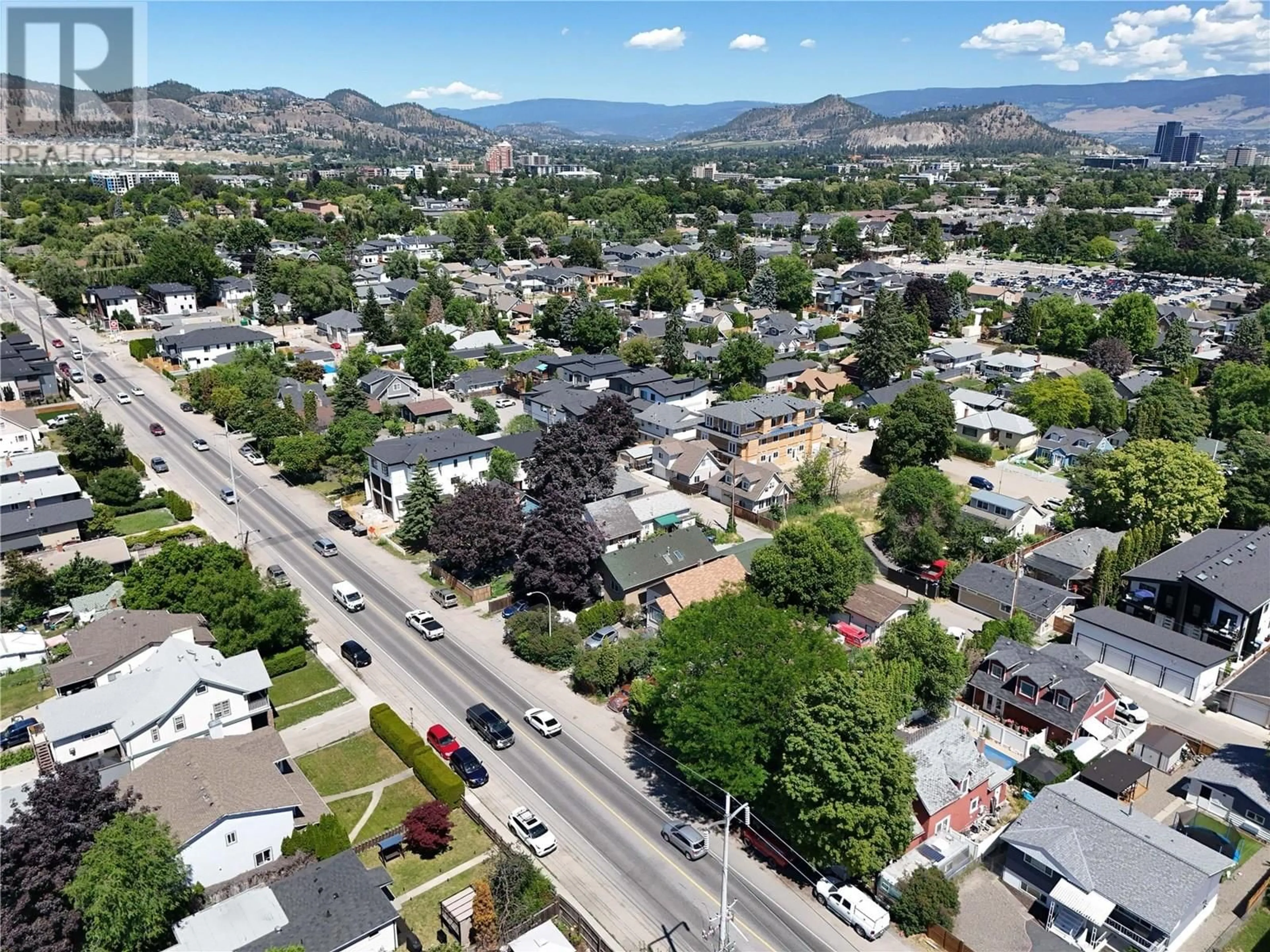 A pic from outside/outdoor area/front of a property/back of a property/a pic from drone, mountain view for 2253 RICHTER STREET, Kelowna British Columbia V1Y2N9