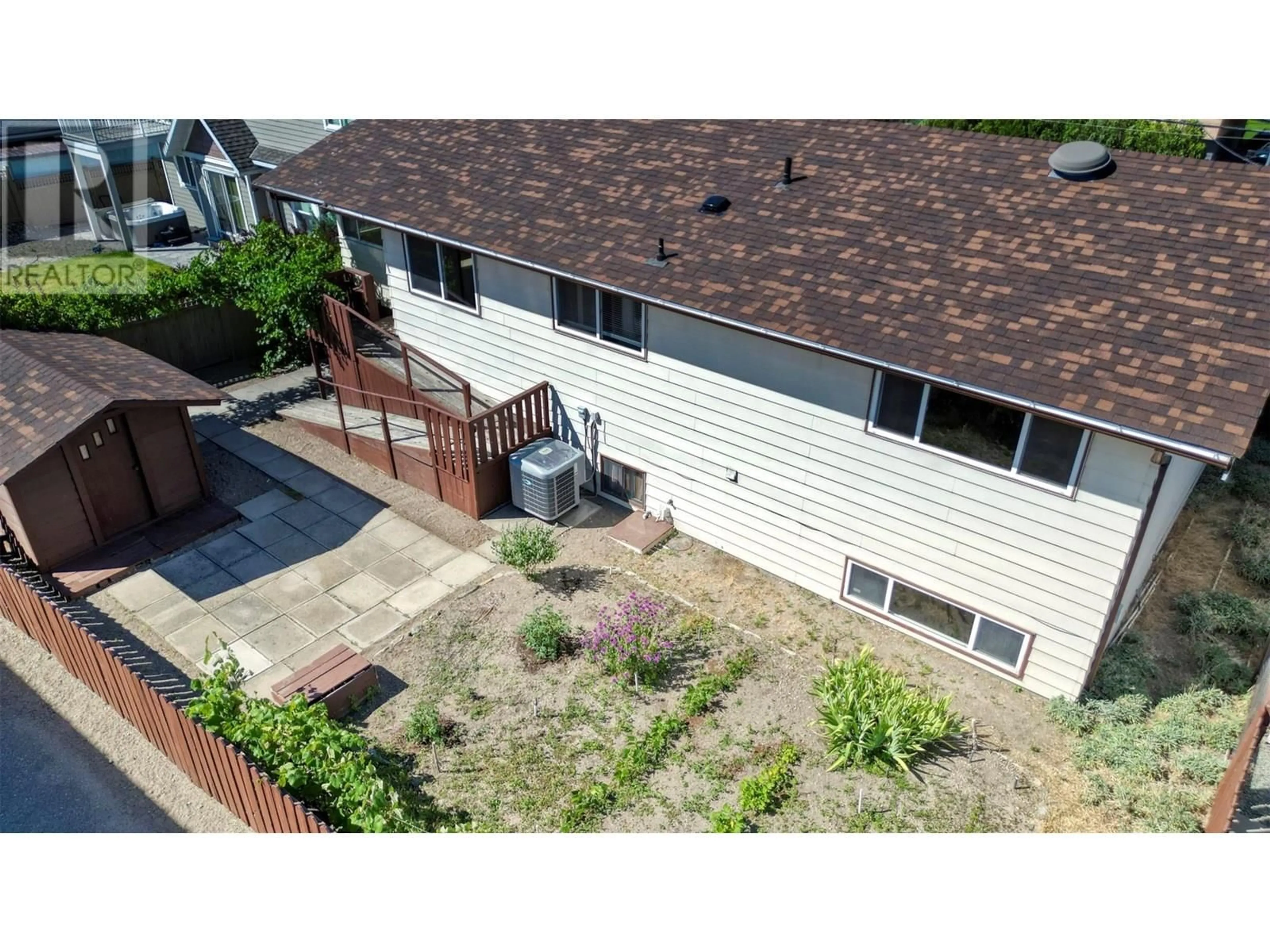 A pic from outside/outdoor area/front of a property/back of a property/a pic from drone, unknown for 5011 89TH STREET, Osoyoos British Columbia V0H1V2