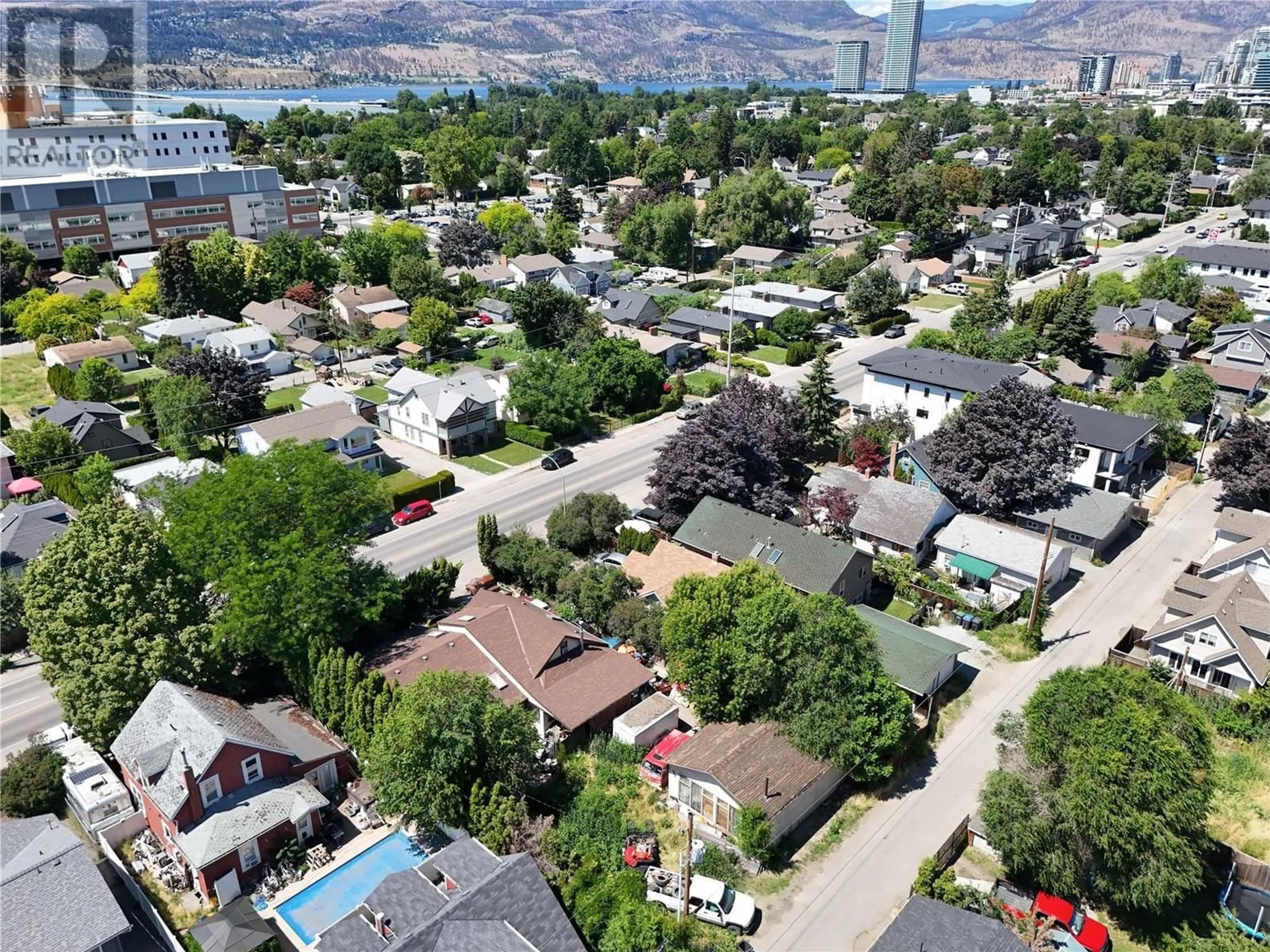 A pic from outside/outdoor area/front of a property/back of a property/a pic from drone, mountain view for 2265 RICHTER STREET, Kelowna British Columbia V1Y2N9