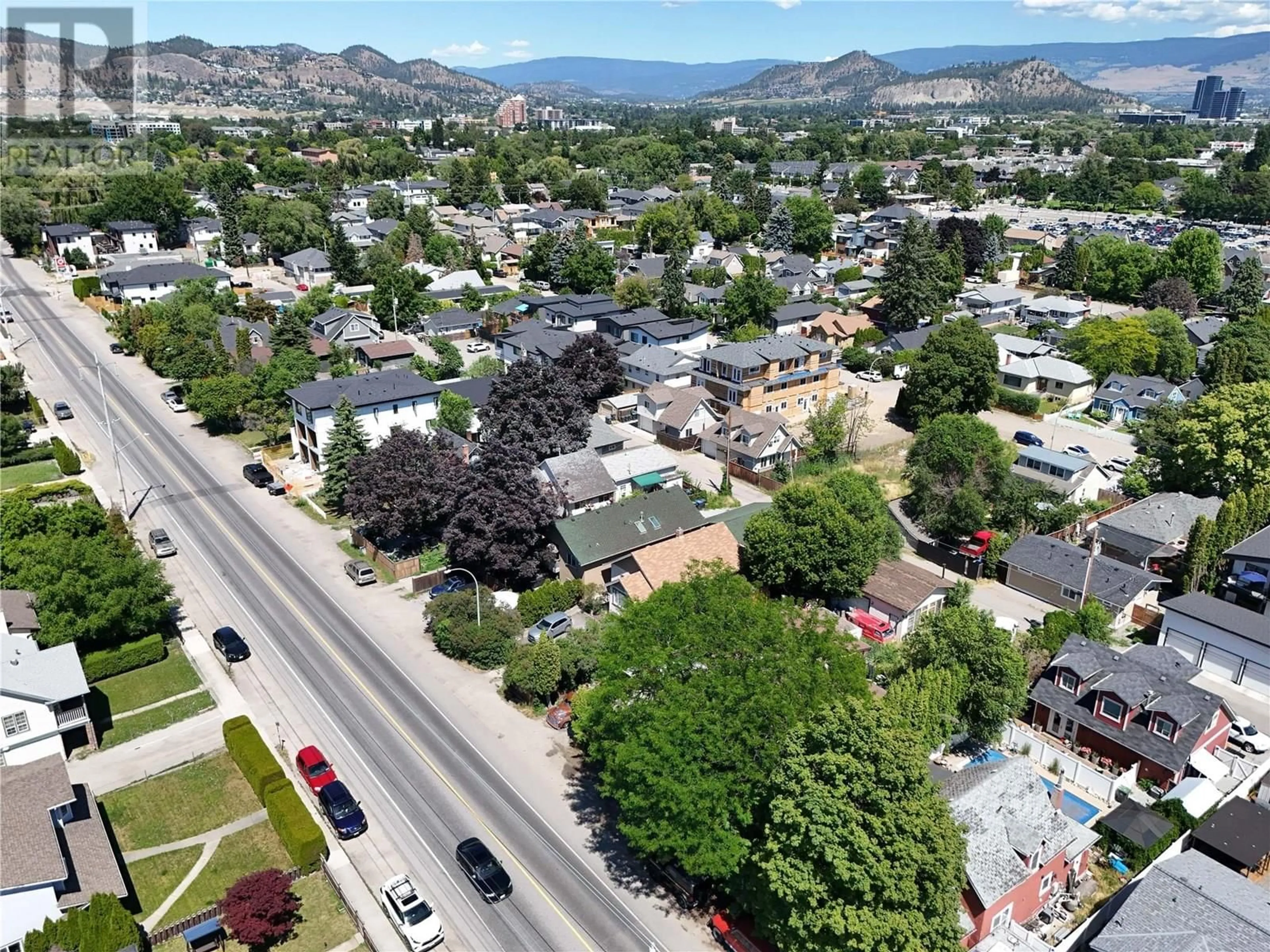 A pic from outside/outdoor area/front of a property/back of a property/a pic from drone, mountain view for 2265 RICHTER STREET, Kelowna British Columbia V1Y2N9