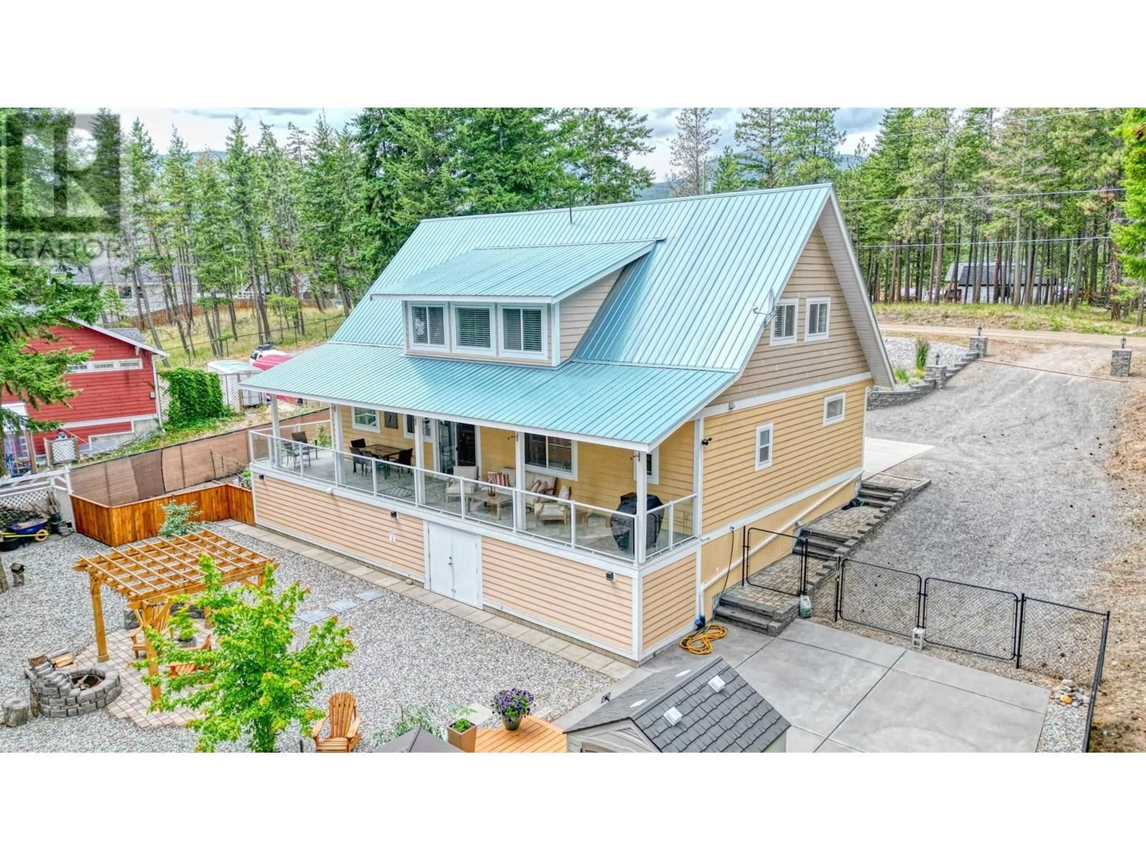 A pic from outside/outdoor area/front of a property/back of a property/a pic from drone, unknown for 7271 DUNWATERS ROAD, Kelowna British Columbia V1Z3W4
