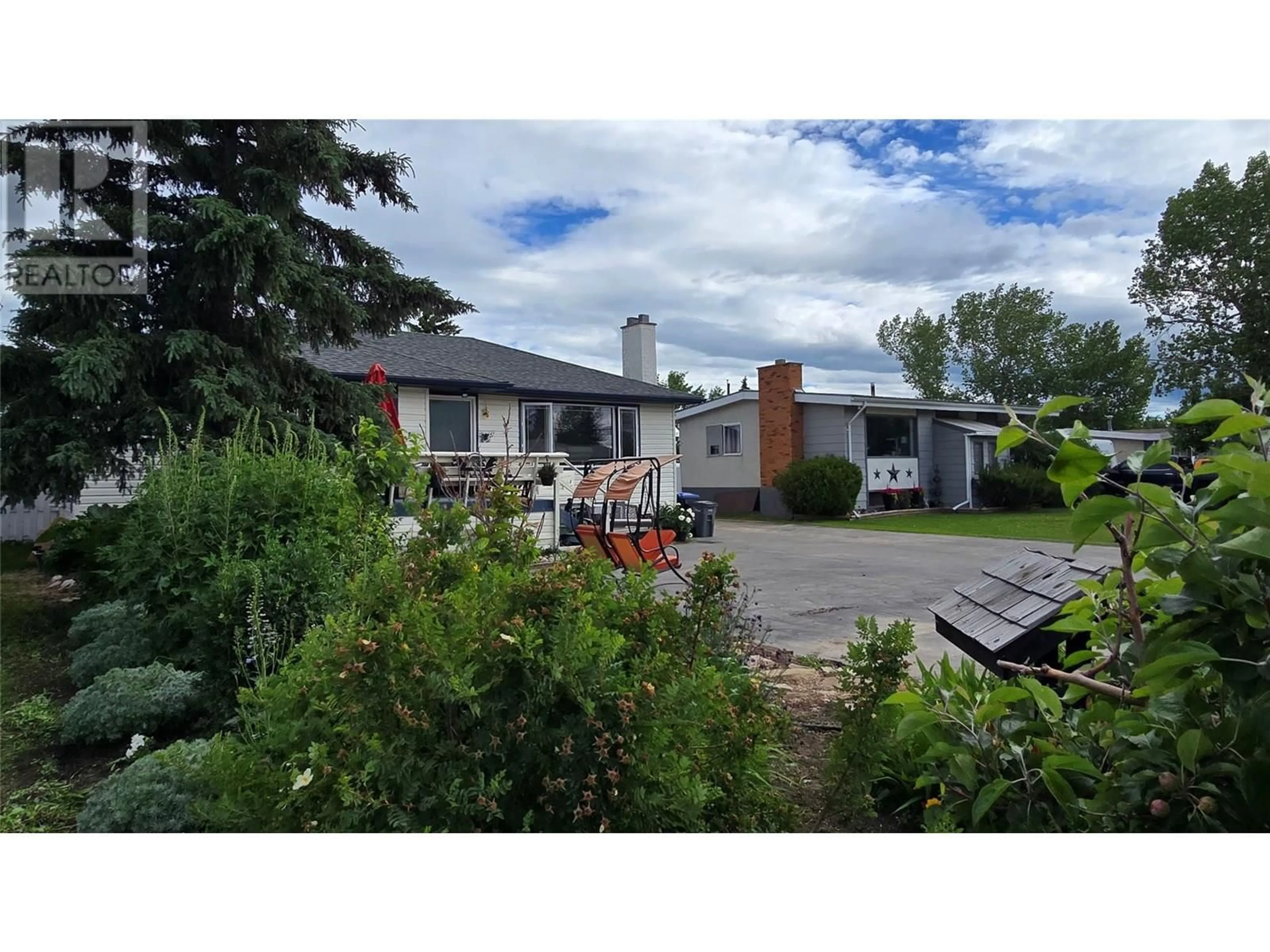 A pic from outside/outdoor area/front of a property/back of a property/a pic from drone, unknown for 1904 108 AVENUE, Dawson Creek British Columbia V1G2T8