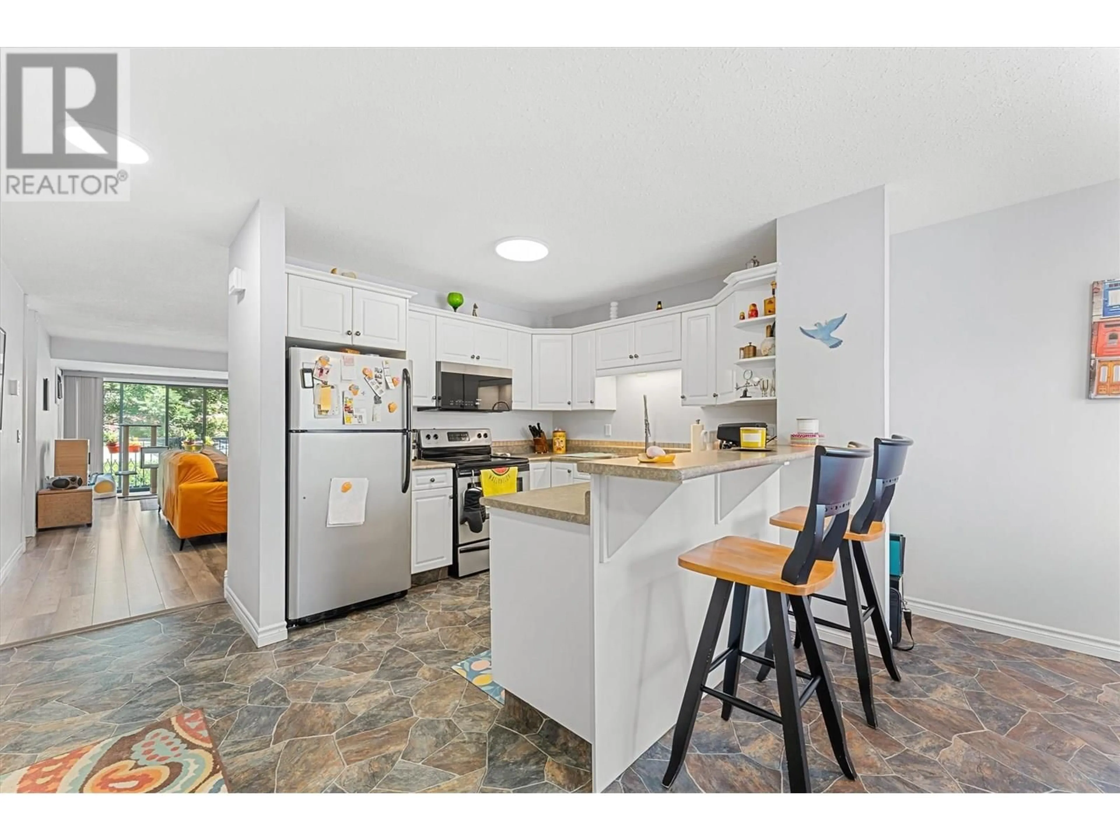 Open concept kitchen, unknown for 201 - 290 MILLS ROAD, Kelowna British Columbia V1X4G8