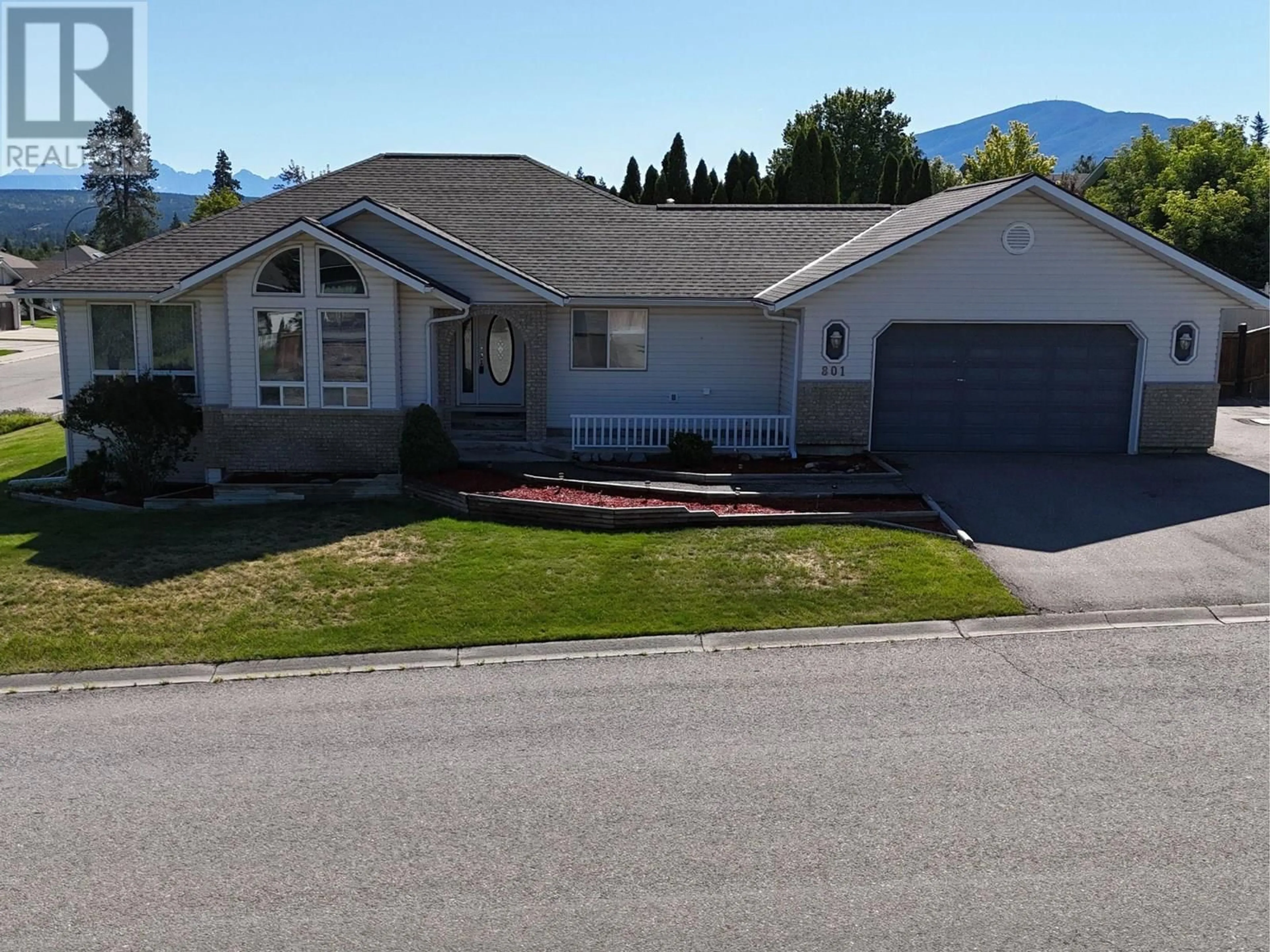 A pic from outside/outdoor area/front of a property/back of a property/a pic from drone, mountain view for 801 16TH STREET SOUTH, Cranbrook British Columbia V1C5N9