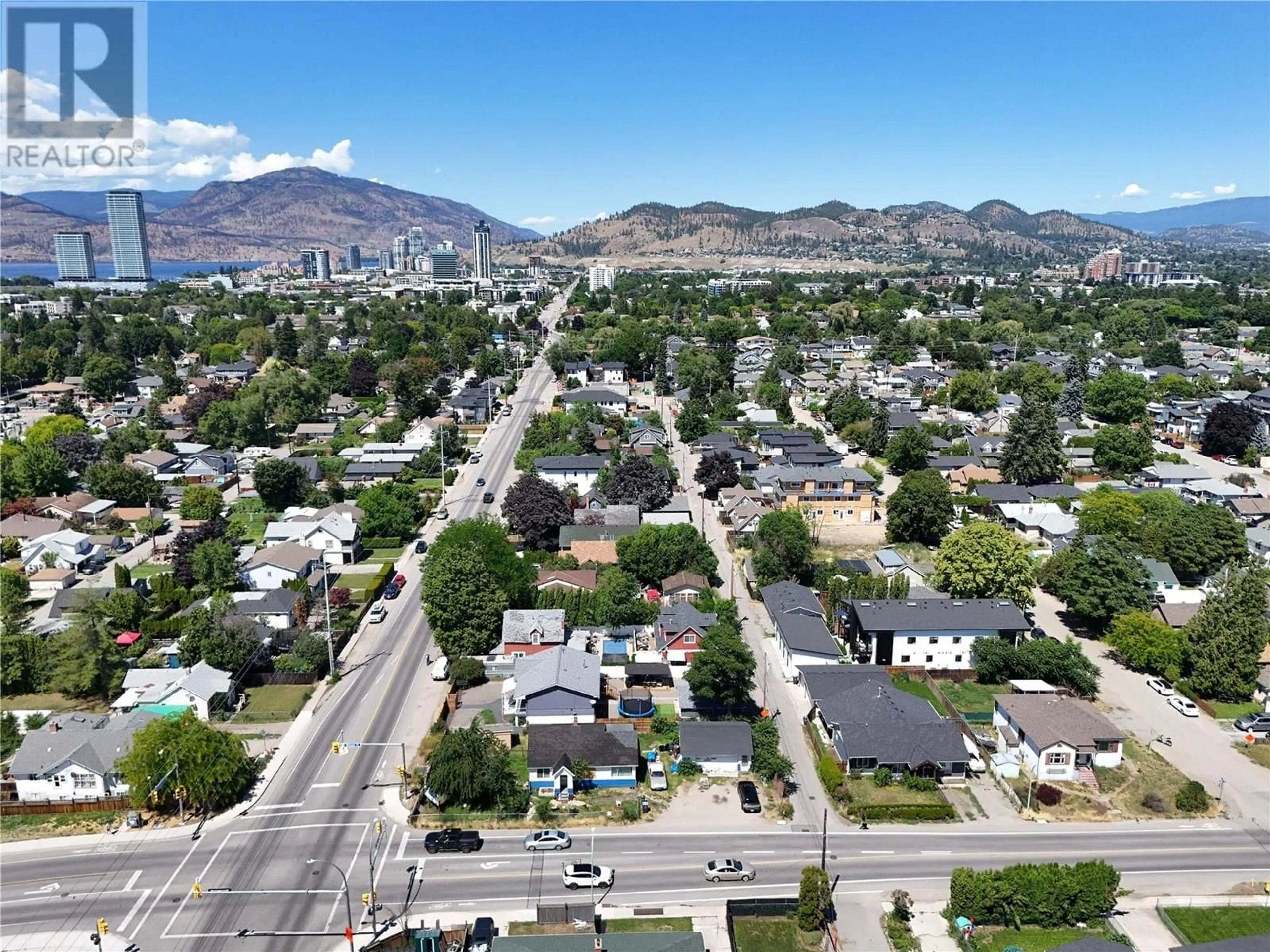 A pic from outside/outdoor area/front of a property/back of a property/a pic from drone, mountain view for 706 ROSE AVENUE, Kelowna British Columbia V1Y5K2