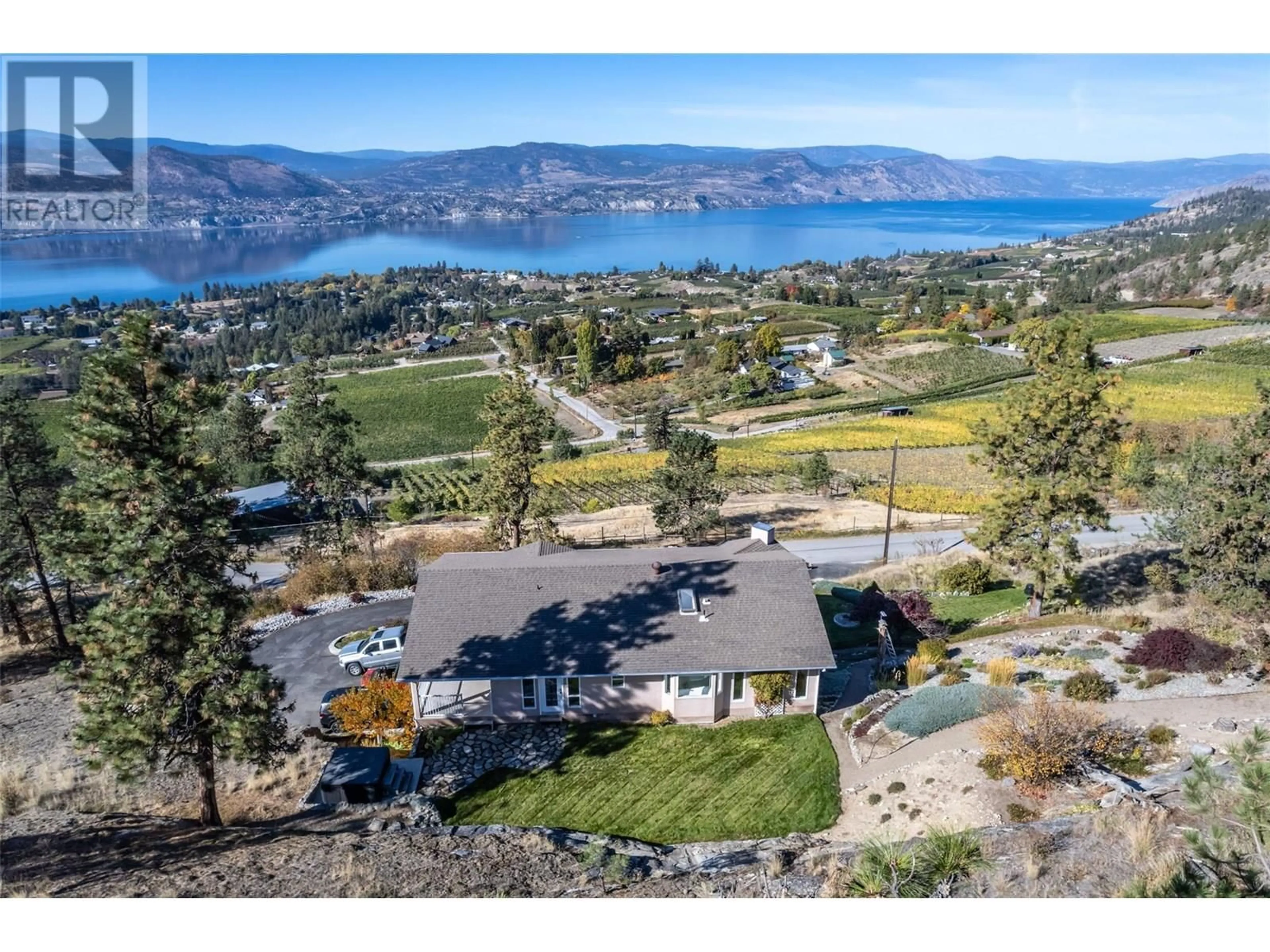 A pic from outside/outdoor area/front of a property/back of a property/a pic from drone, water/lake/river/ocean view for 1380 SMETHURST ROAD, Naramata British Columbia V0H1N1