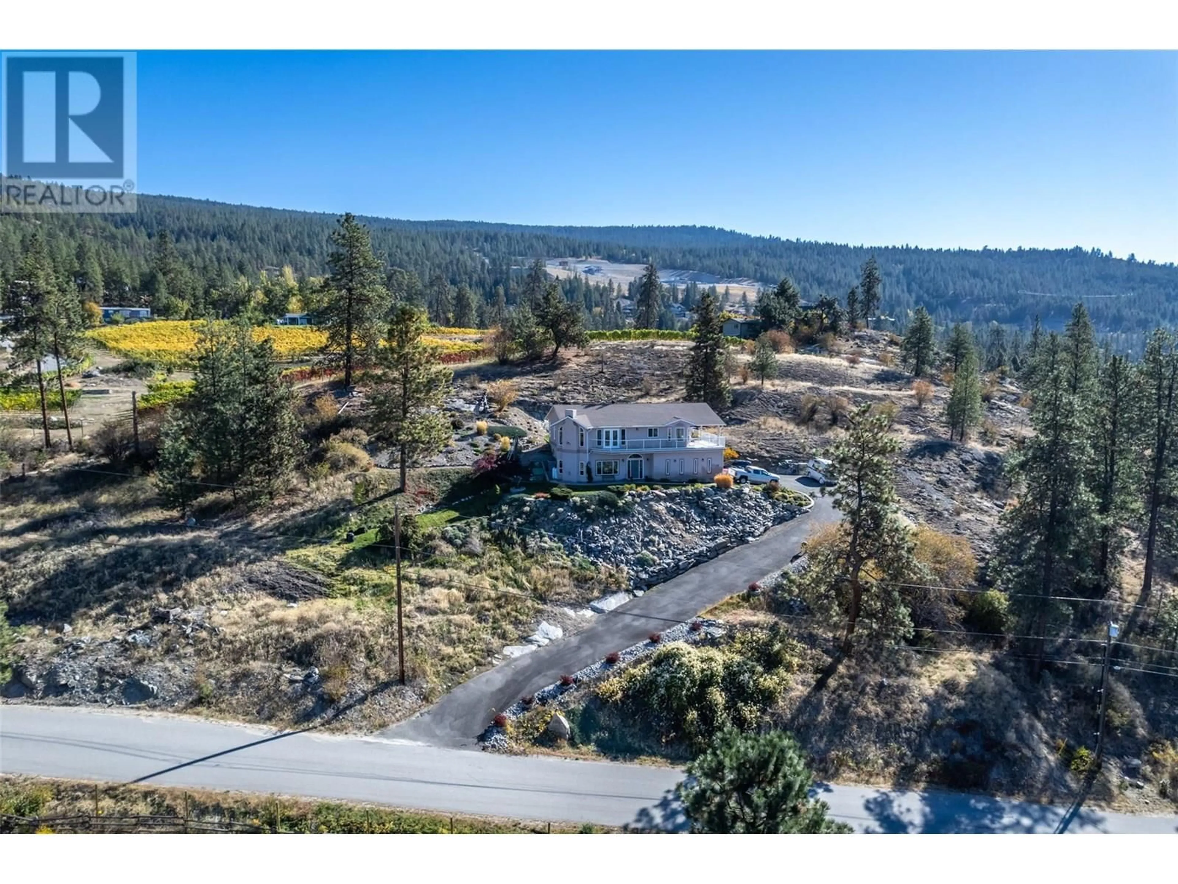 A pic from outside/outdoor area/front of a property/back of a property/a pic from drone, mountain view for 1380 SMETHURST ROAD, Naramata British Columbia V0H1N1