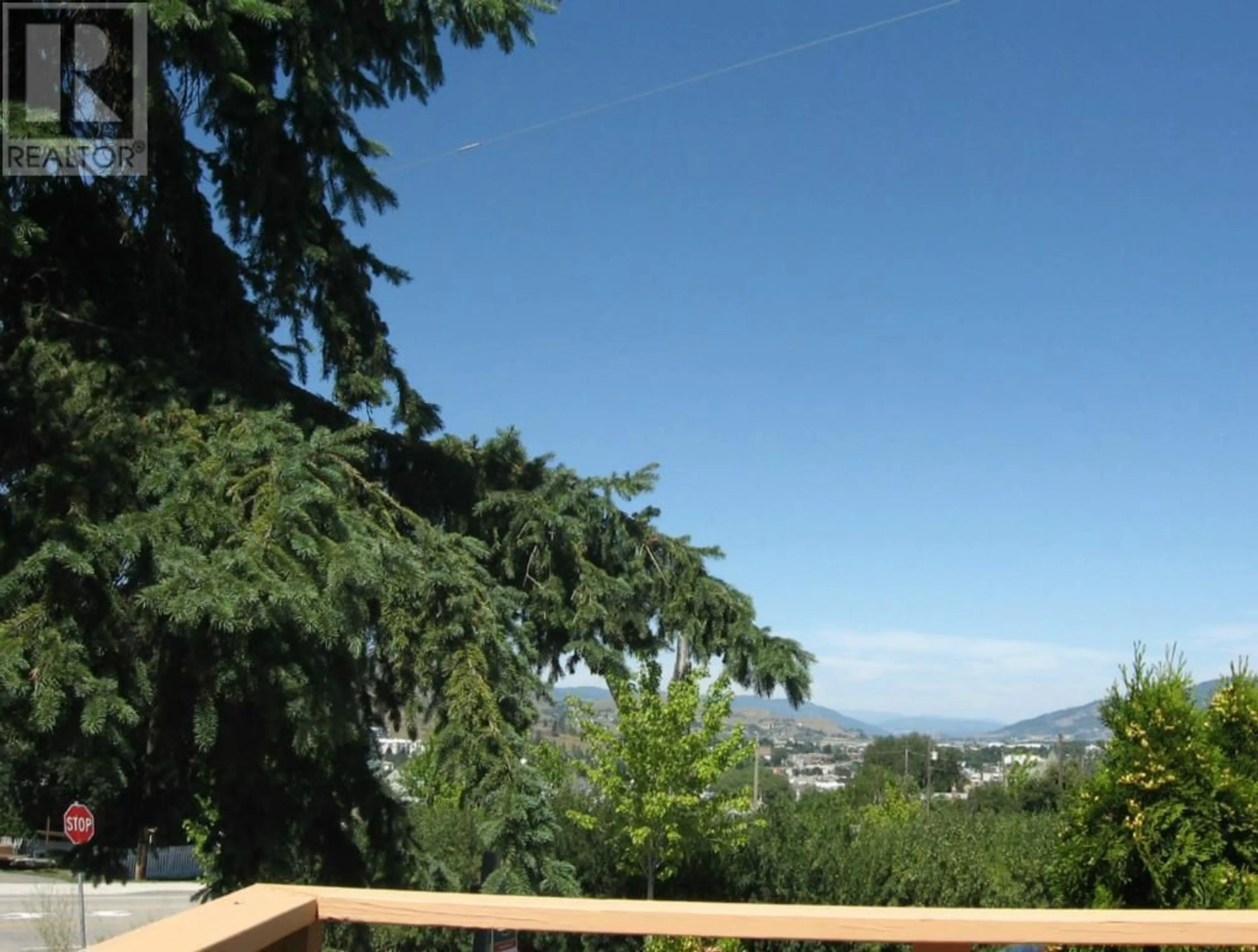 A pic from outside/outdoor area/front of a property/back of a property/a pic from drone, mountain view for 3408 16TH AVENUE, Vernon British Columbia V1T1A8