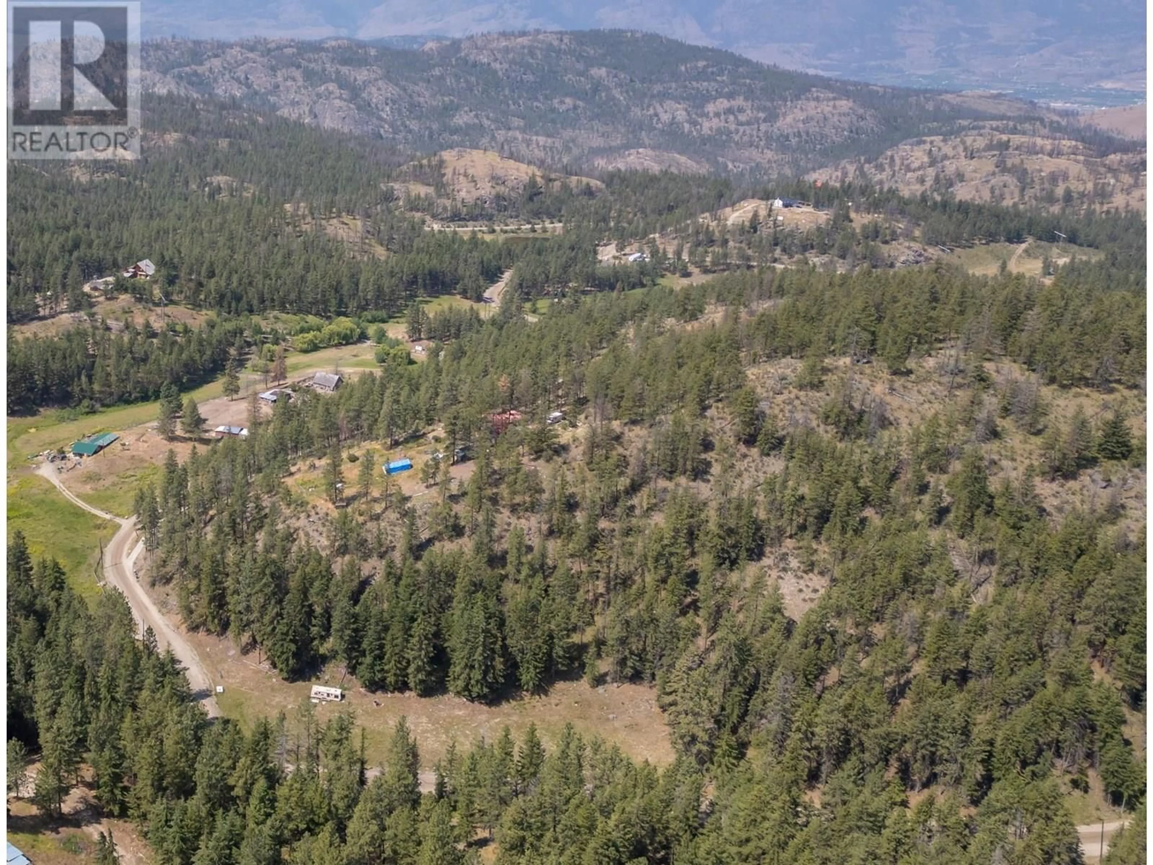 A pic from outside/outdoor area/front of a property/back of a property/a pic from drone, forest/trees view for 256 MCCUDDY CREEK ROAD, Oliver British Columbia V0H1T8