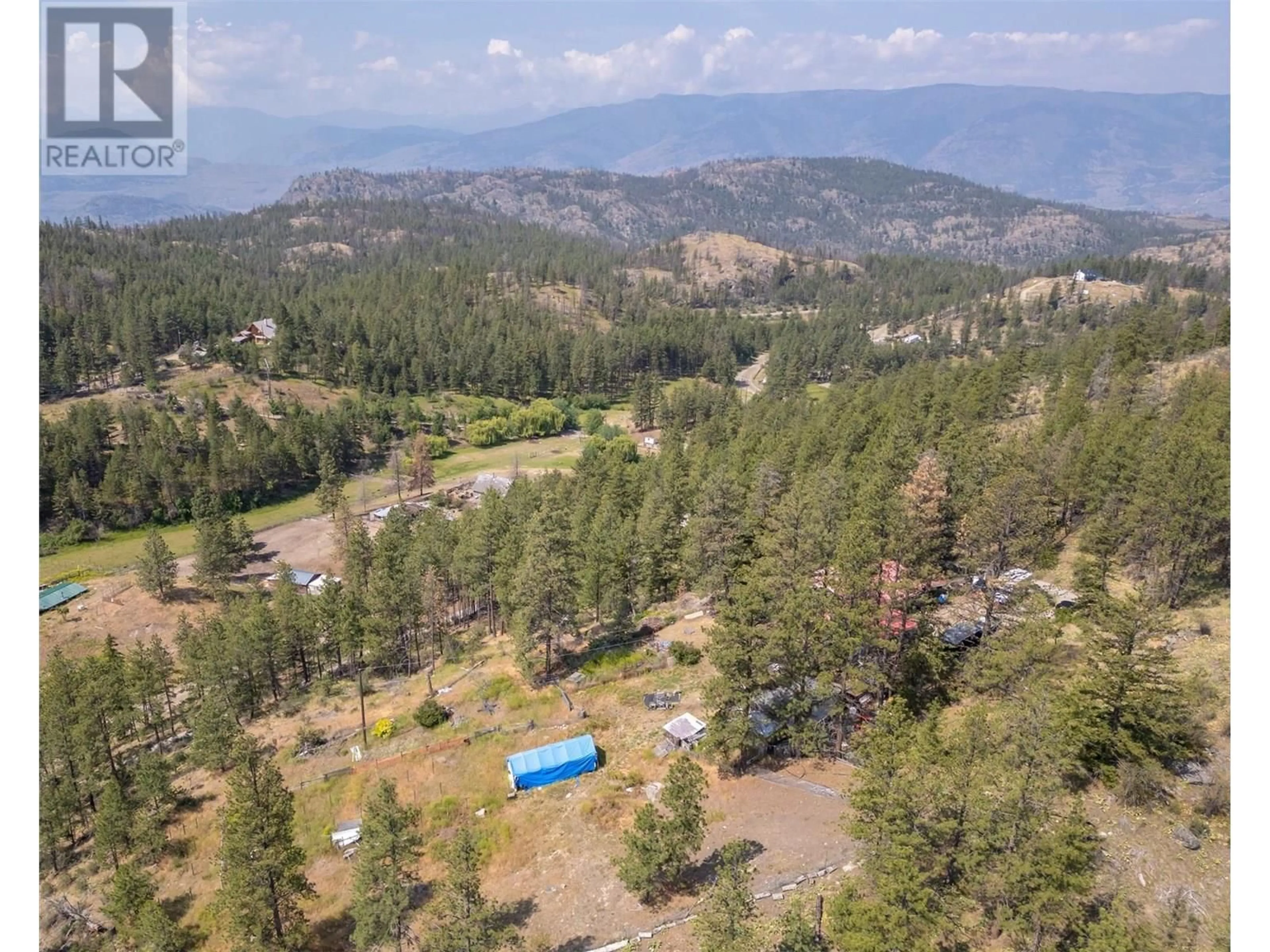 A pic from outside/outdoor area/front of a property/back of a property/a pic from drone, forest/trees view for 256 MCCUDDY CREEK ROAD, Oliver British Columbia V0H1T8