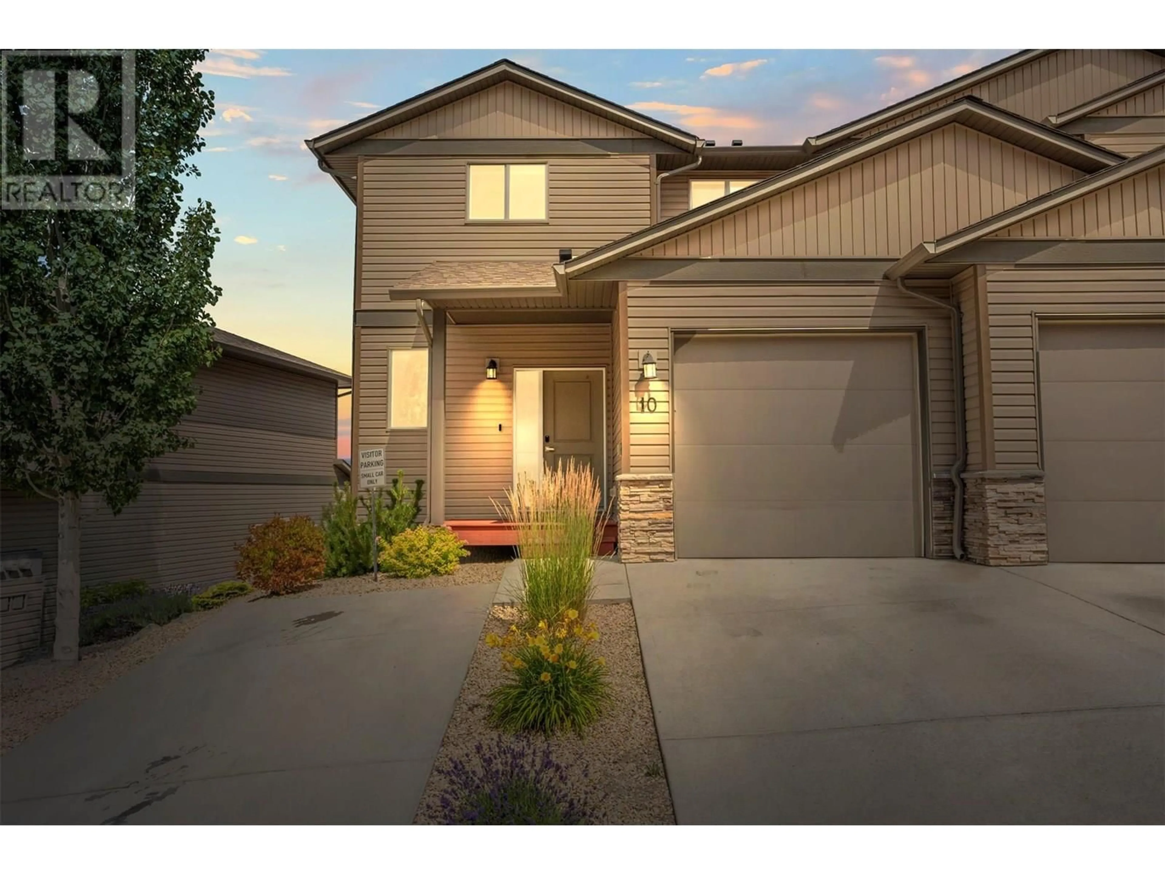 Home with brick exterior material, street for 10 - 933 MOUNT ROBSON PLACE, Vernon British Columbia V1B4G4
