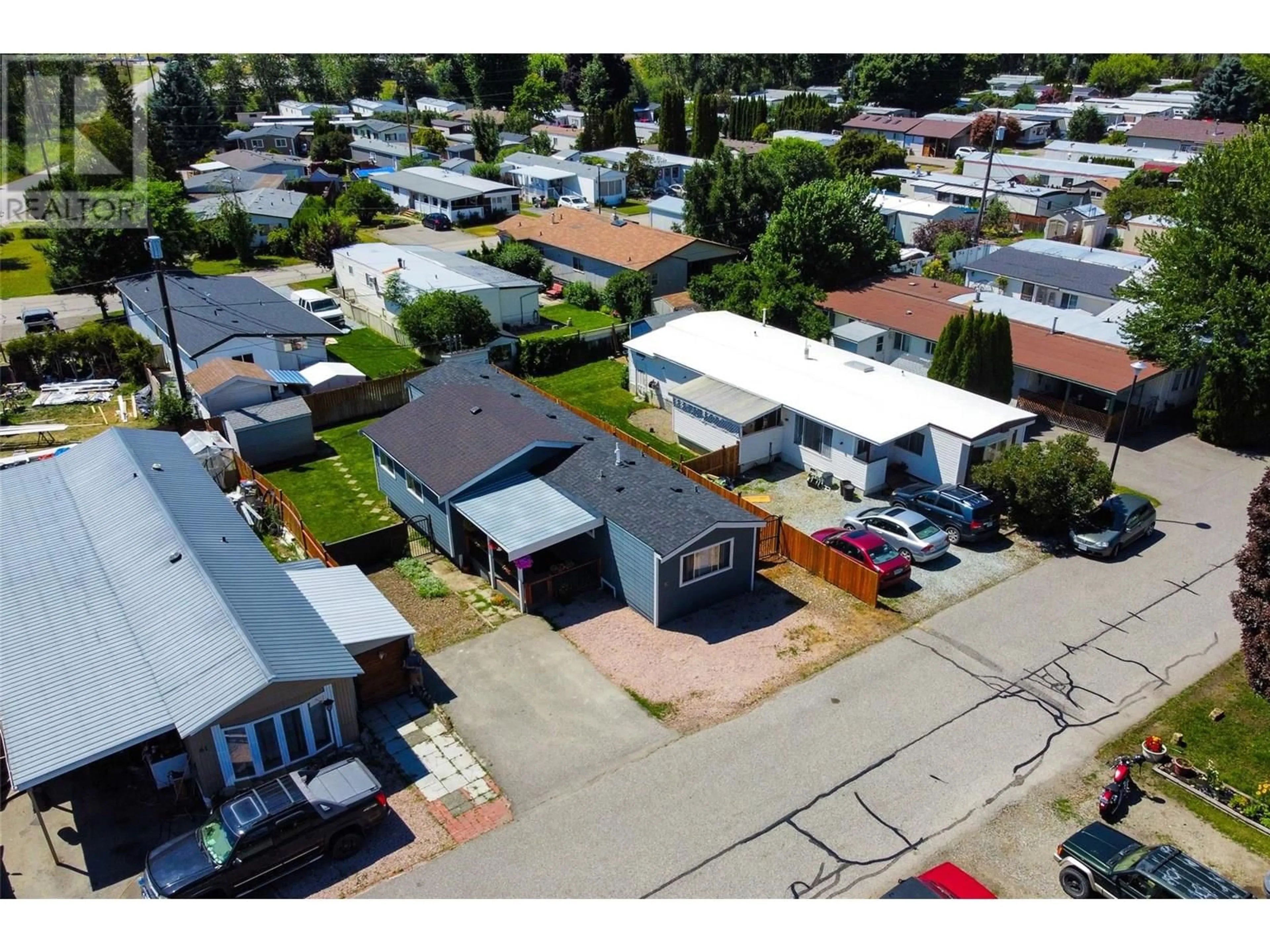 A pic from outside/outdoor area/front of a property/back of a property/a pic from drone, street for 62 - 720 COMMONWEALTH ROAD, Lake Country British Columbia V4V1R6