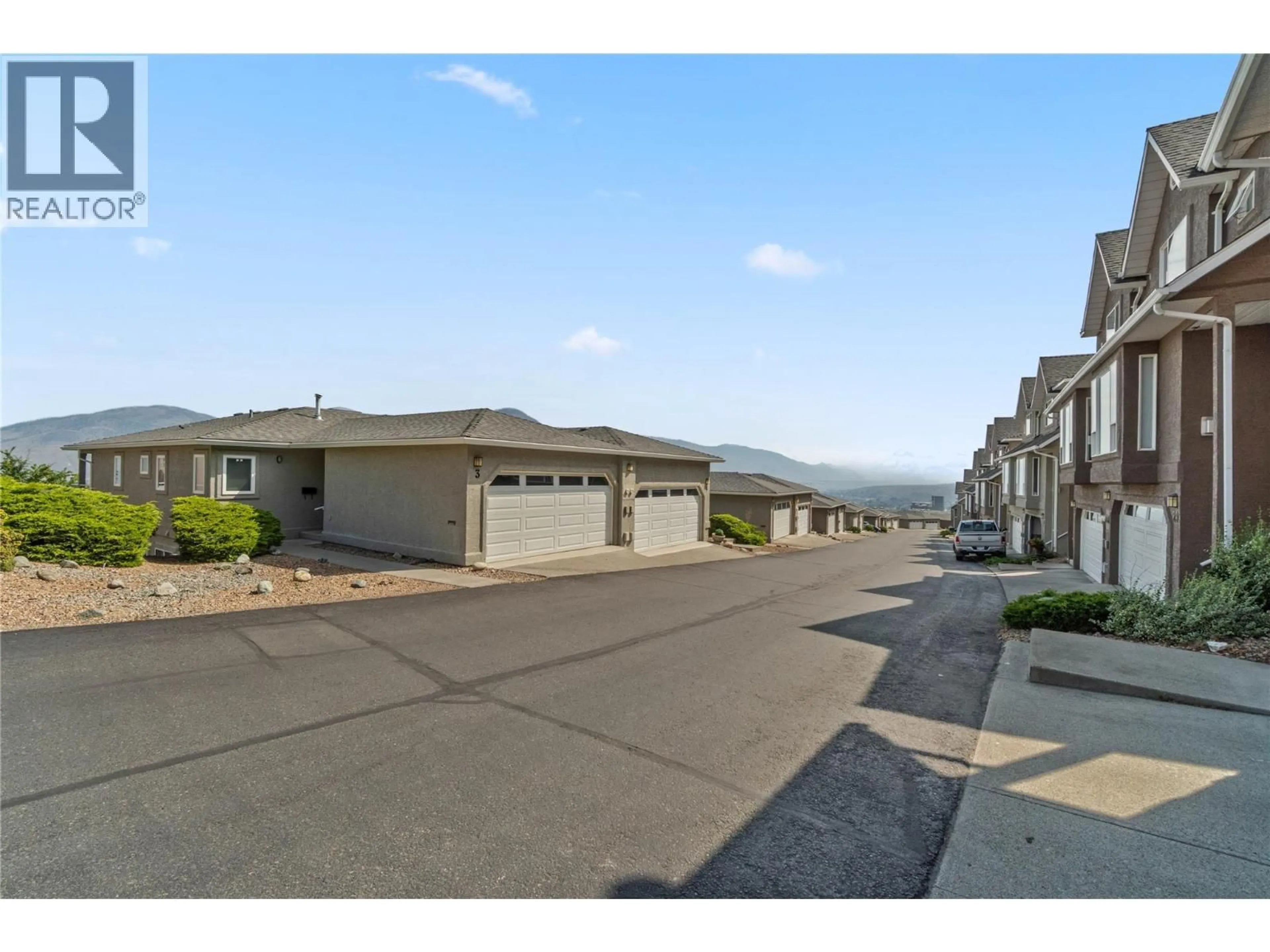 A pic from outside/outdoor area/front of a property/back of a property/a pic from drone, mountain view for 3 - 255 PEMBERTON TERRACE, Kamloops British Columbia V2C6R2