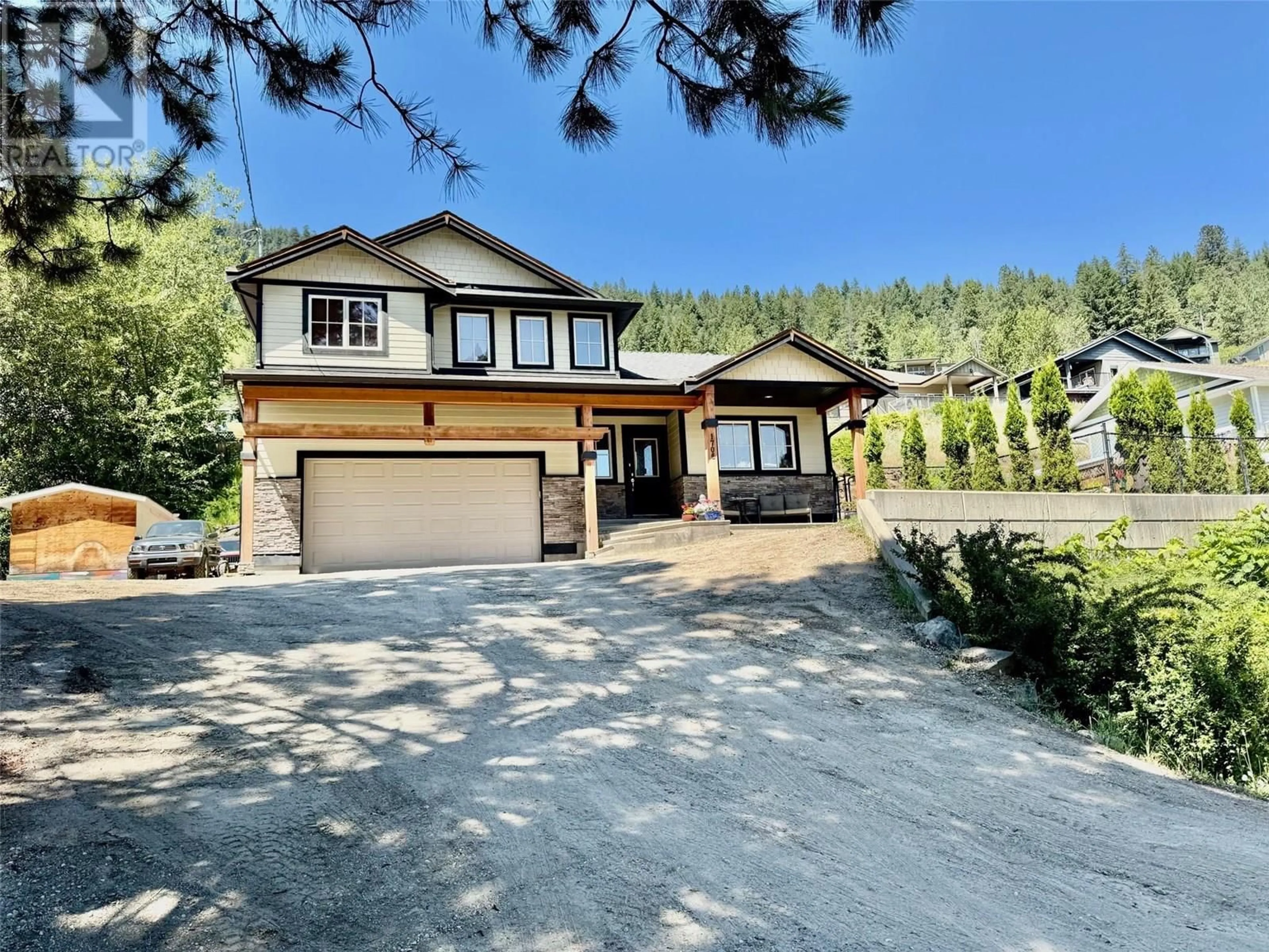 A pic from outside/outdoor area/front of a property/back of a property/a pic from drone, mountain view for 1706 GRANDVIEW AVENUE, Lumby British Columbia V0E2G0