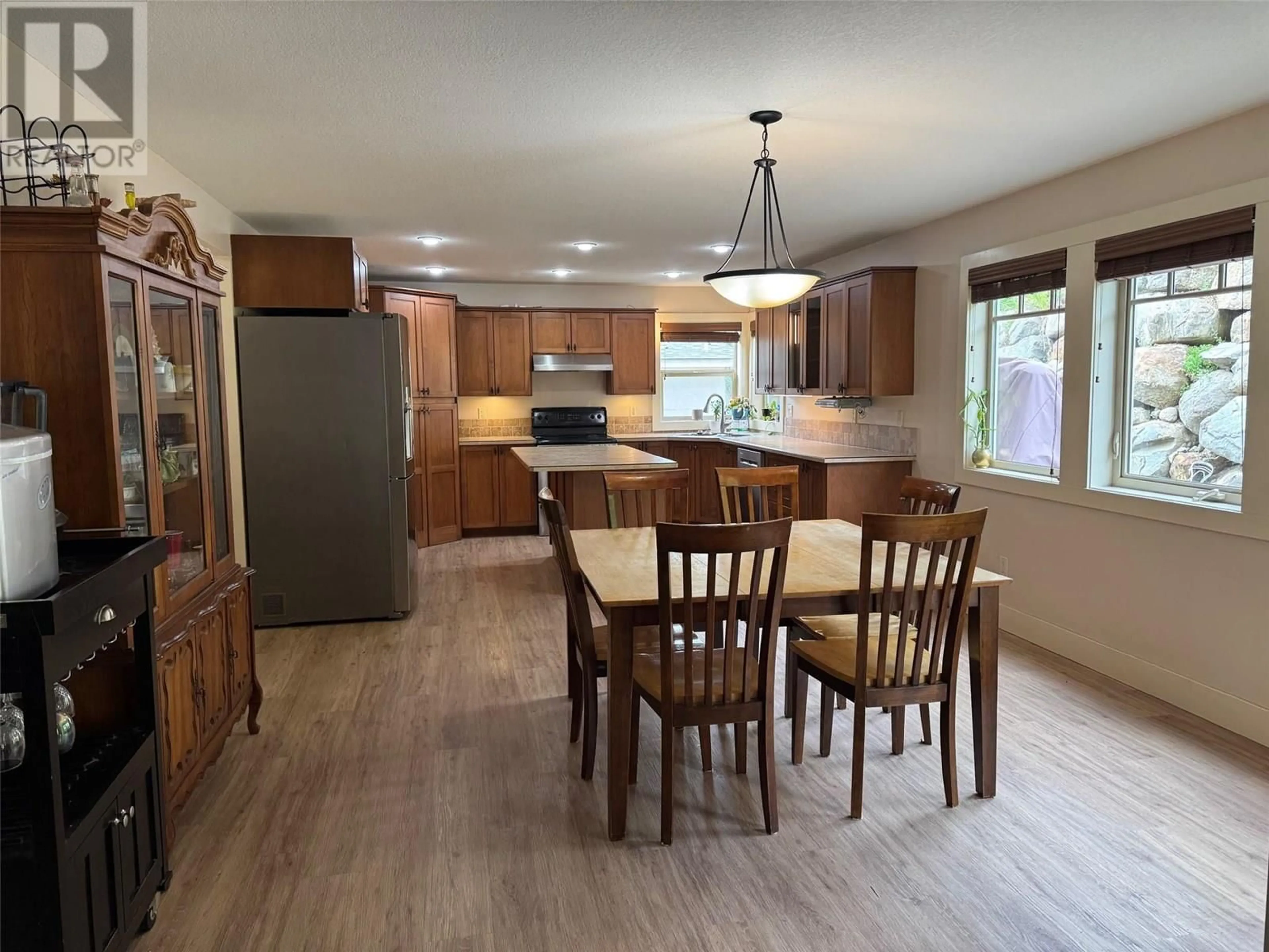 Open concept kitchen, wood/laminate floor for 1706 GRANDVIEW AVENUE, Lumby British Columbia V0E2G0